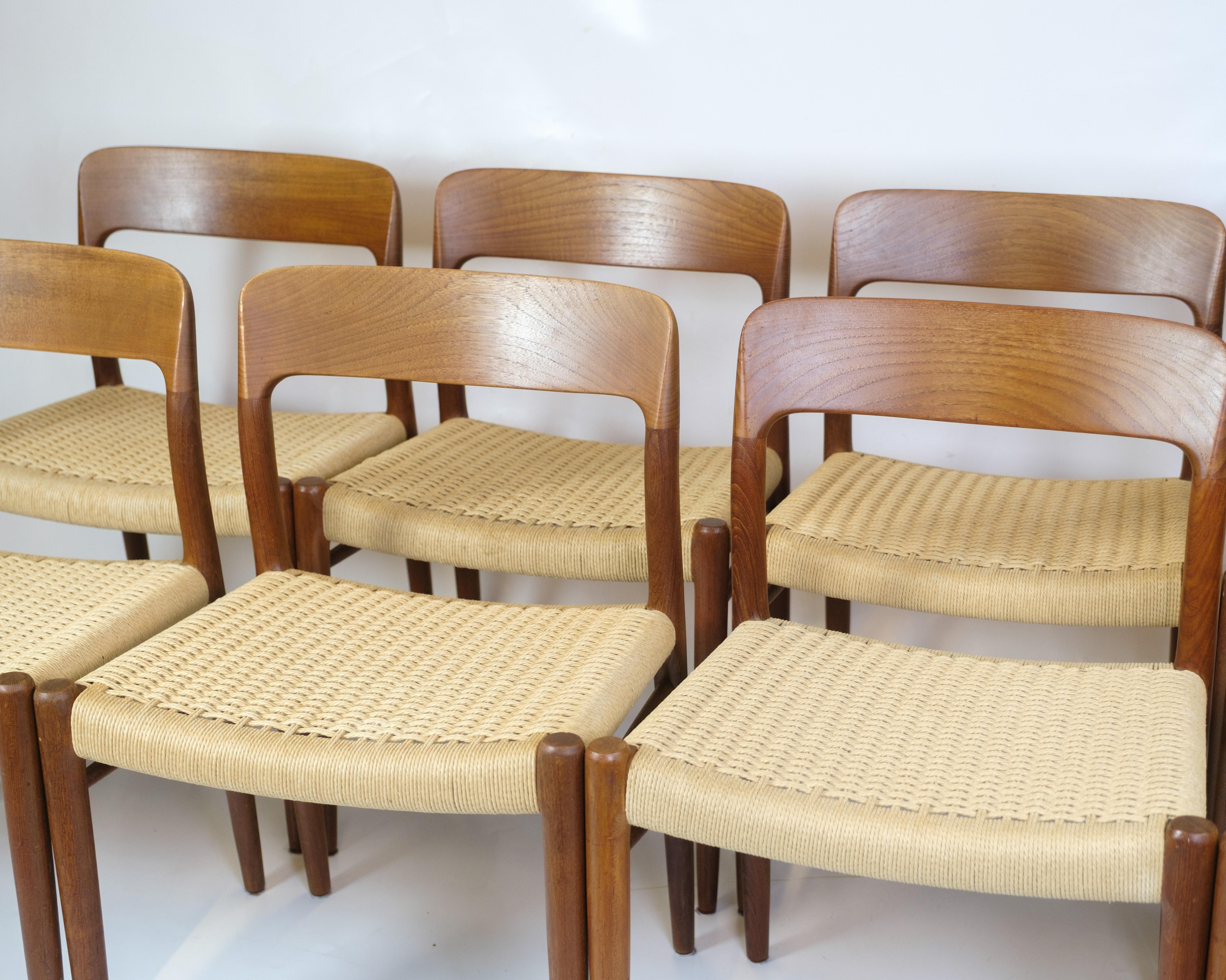 Mid-Century Modern Set Of Eight Dining Chairs Model 75 In Teak & Paper Wicker By N.O Møller For Sale