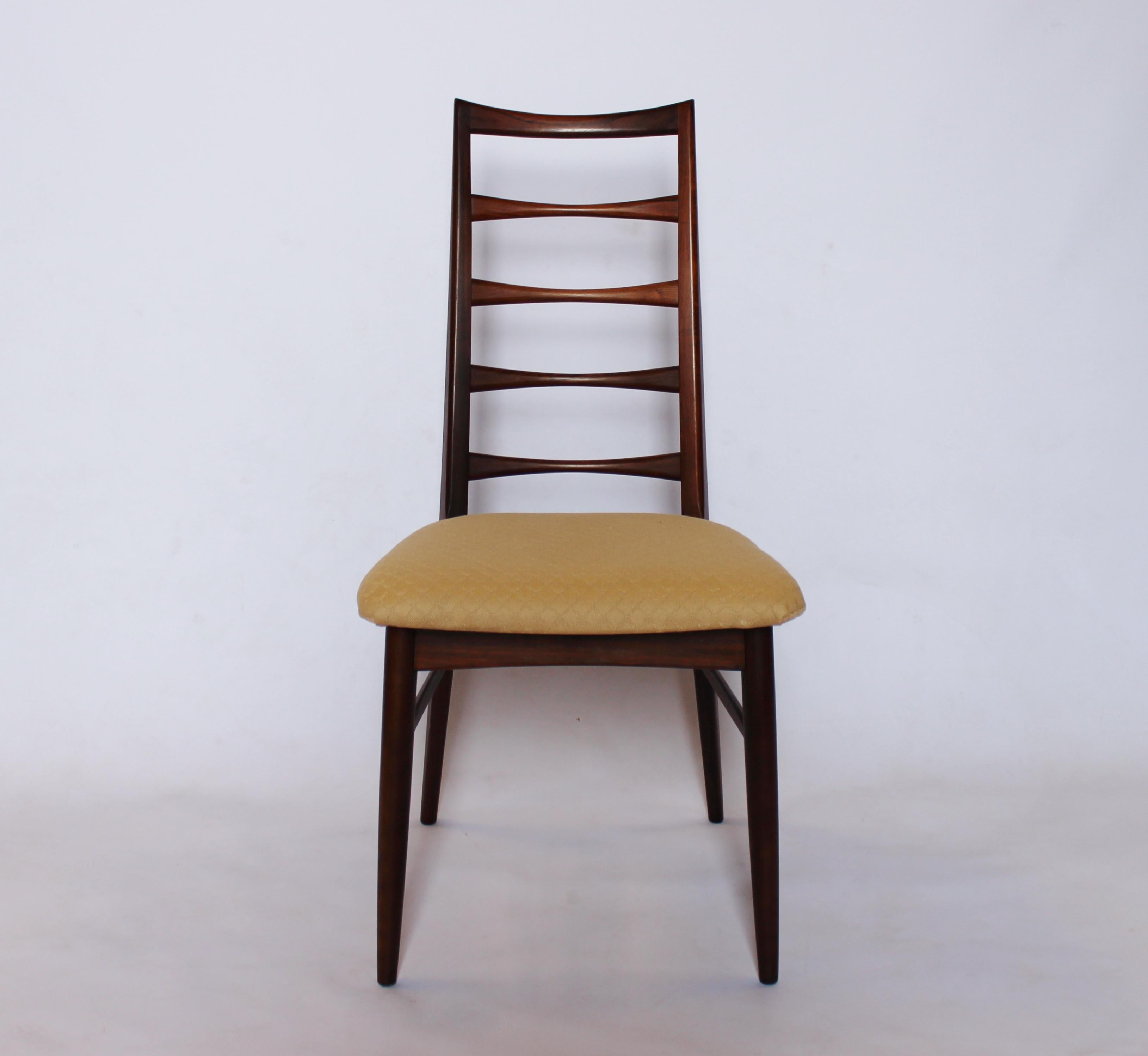 Set of eight dining room chairs, model Lis, in rosewood designed by Niels Koefoed in 1961 and manufactured by Koefoed furniture factory, Hornslet in the 1960s. The chairs are in great vintage condition.