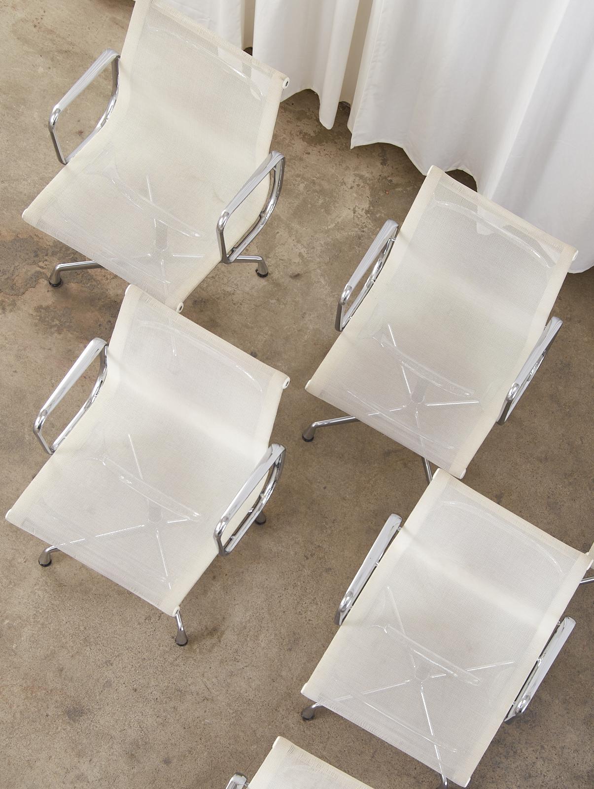 Contemporary Set of Eight Eames Mid-Century Chrome Armchairs by Vitra