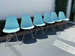 Set of eight Eames molded plastic chairs Aquasky
