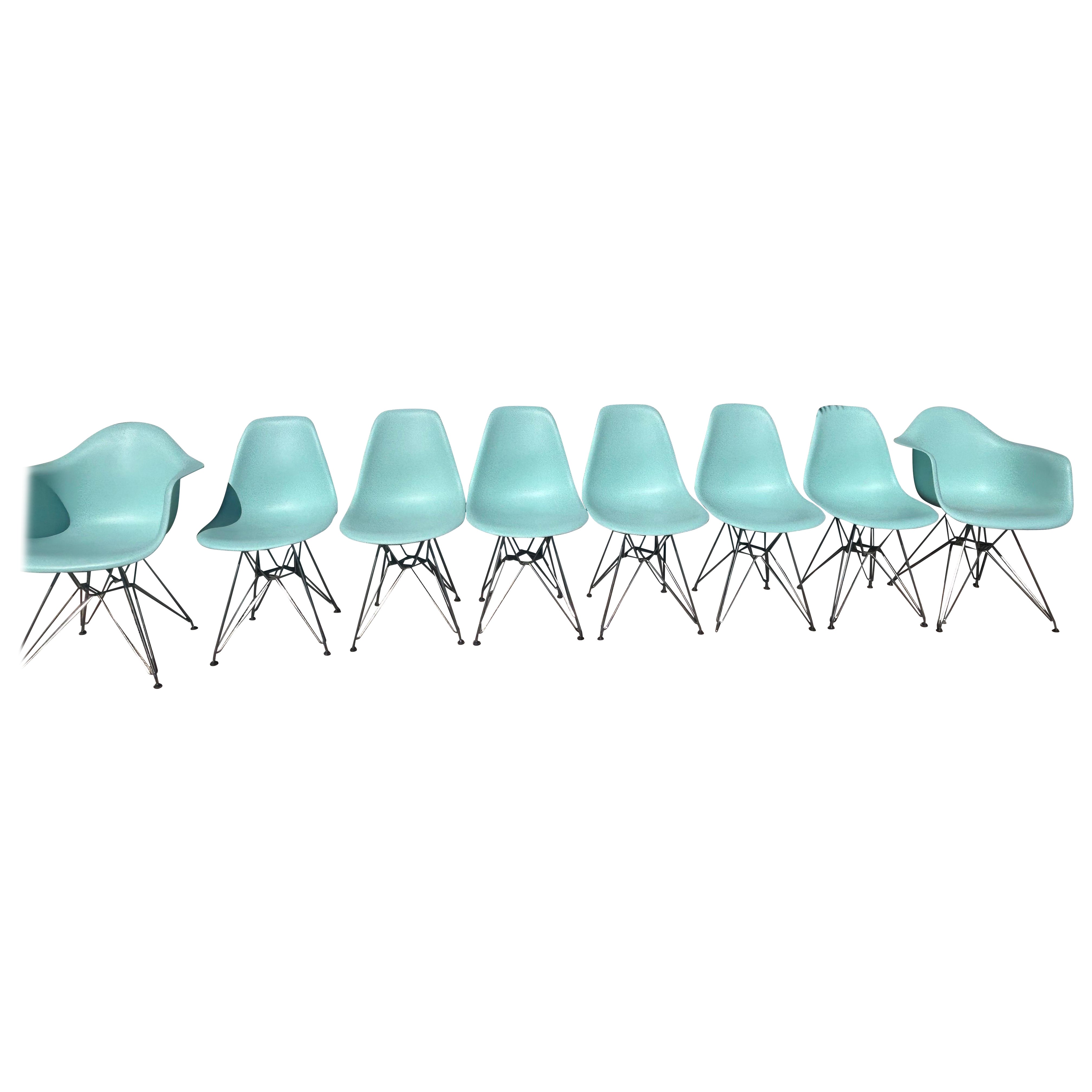 Set of eight Eames molded plastic chairs Aquasky