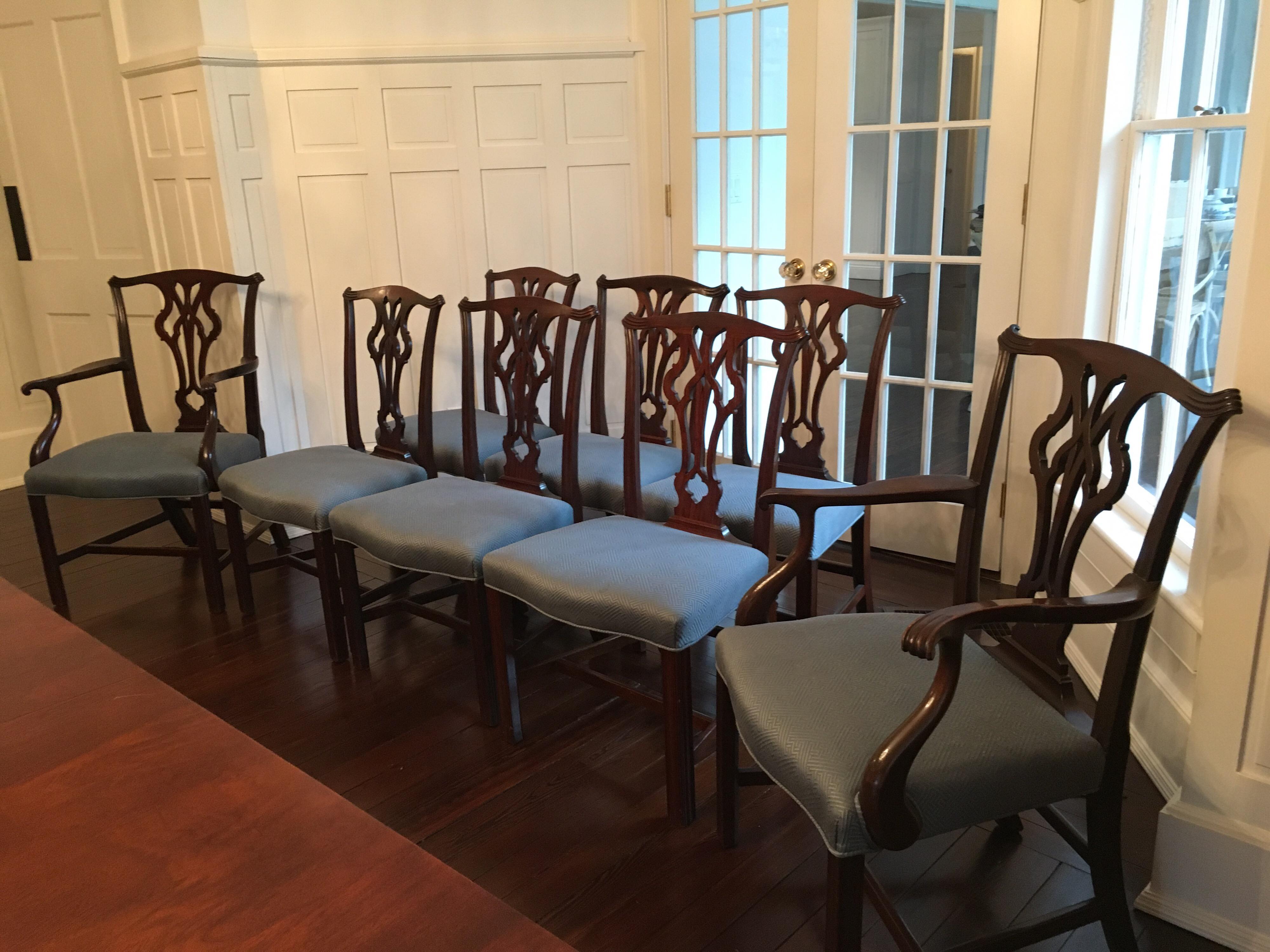 Set of eight early 20th century Chippendale style dining chairs in blue Greek key fabric.
Armchair dims: 26.5