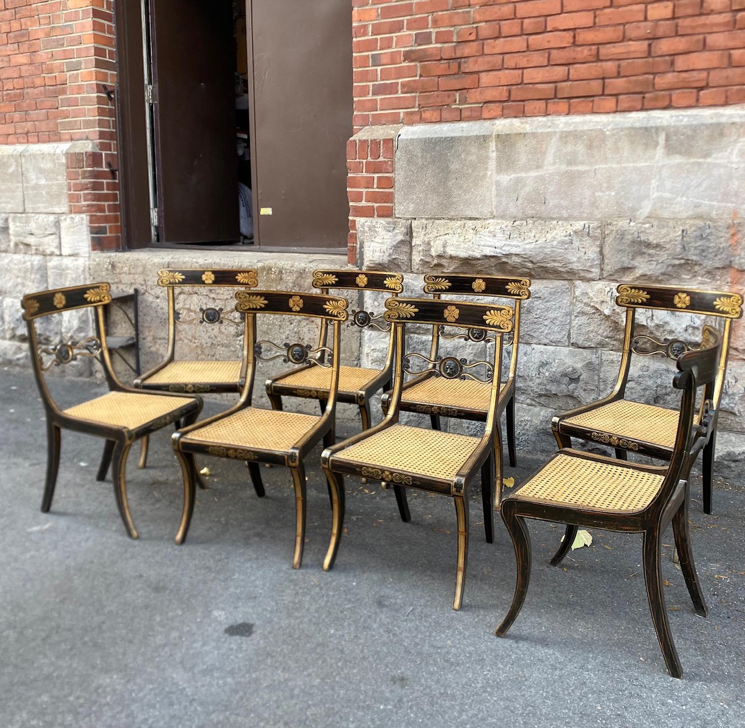 British Set Of Eight Ebonised Beechwood and Caned Regency Period Dining Chairs For Sale