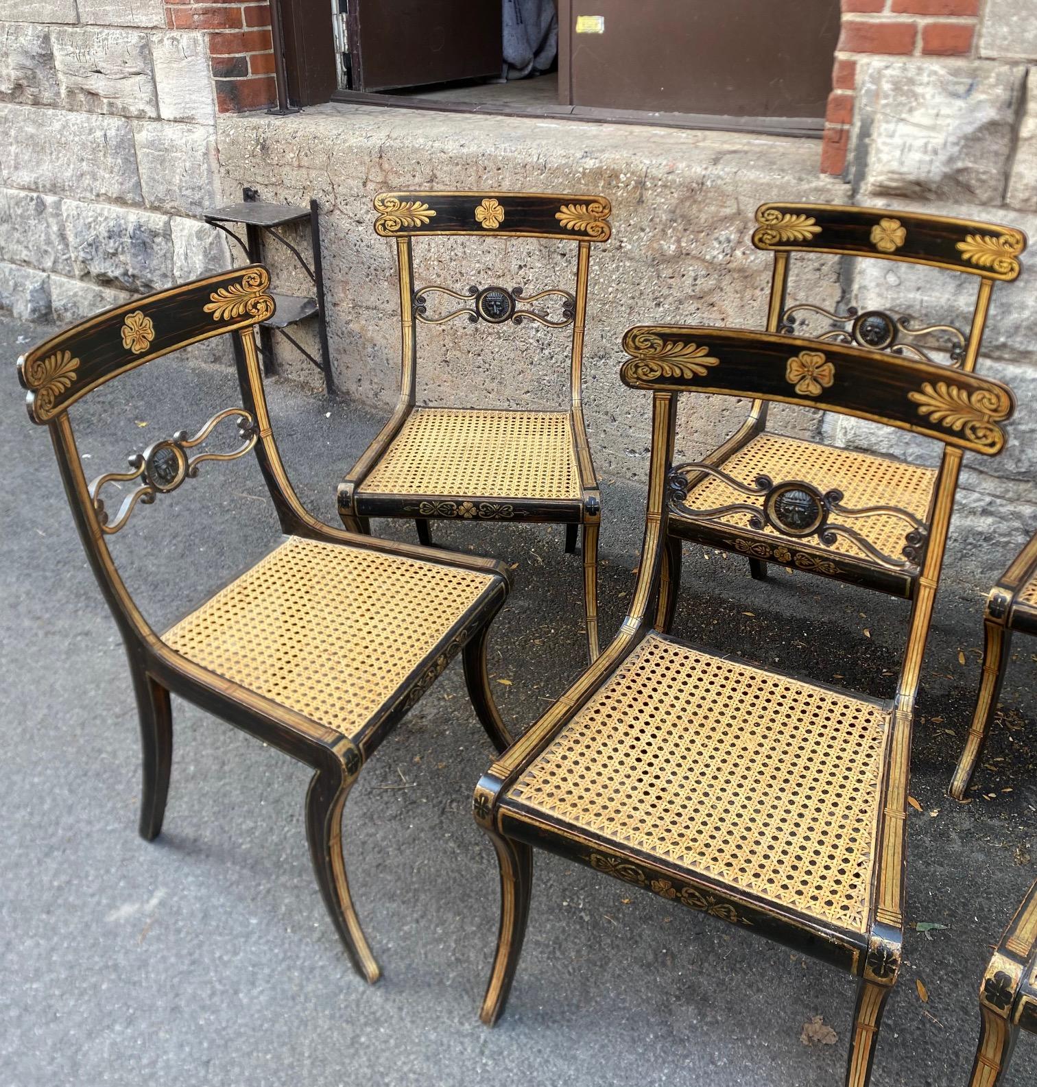 Painted Set Of Eight Ebonised Beechwood and Caned Regency Period Dining Chairs For Sale