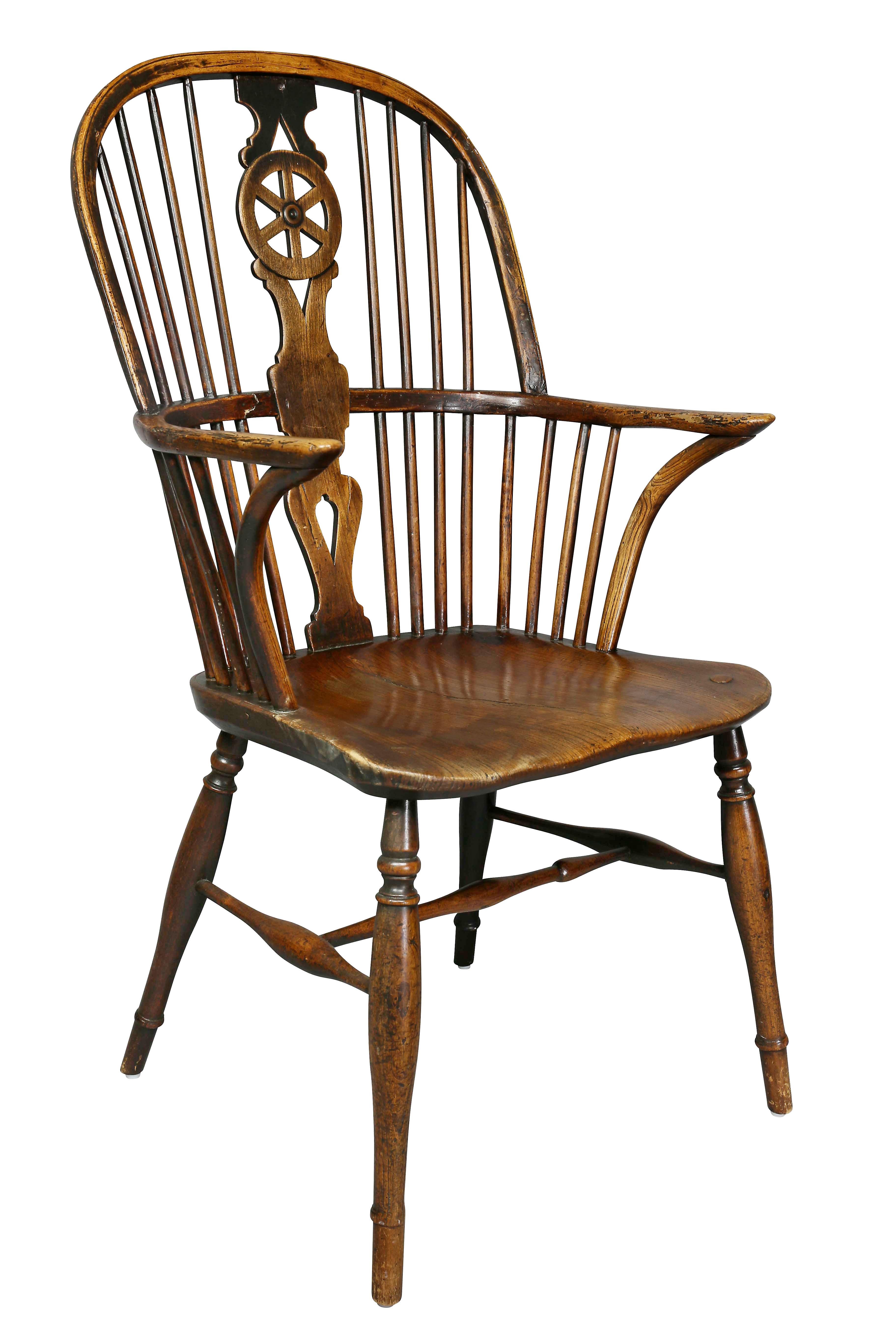 Very well matched set with one chair slightly different, comprising two-arm and six sides. Arched backs with wheel splat, shaped seat, turned tapered legs with H stretchers. Made originally in the Wycombe area of Buckinghamshire.