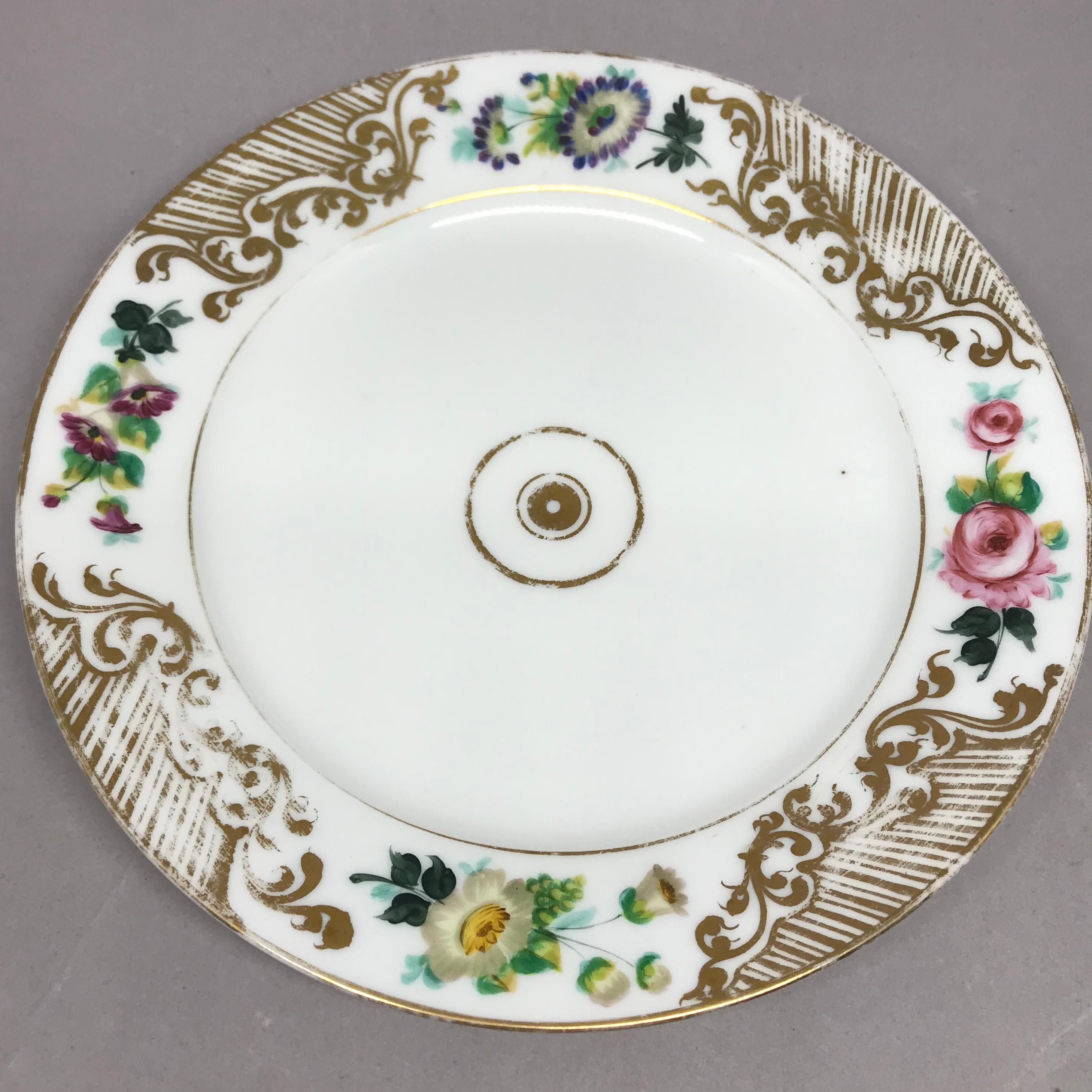 Hand-Painted Set of Eight Empire Floral and Gilt Decorated Plates For Sale