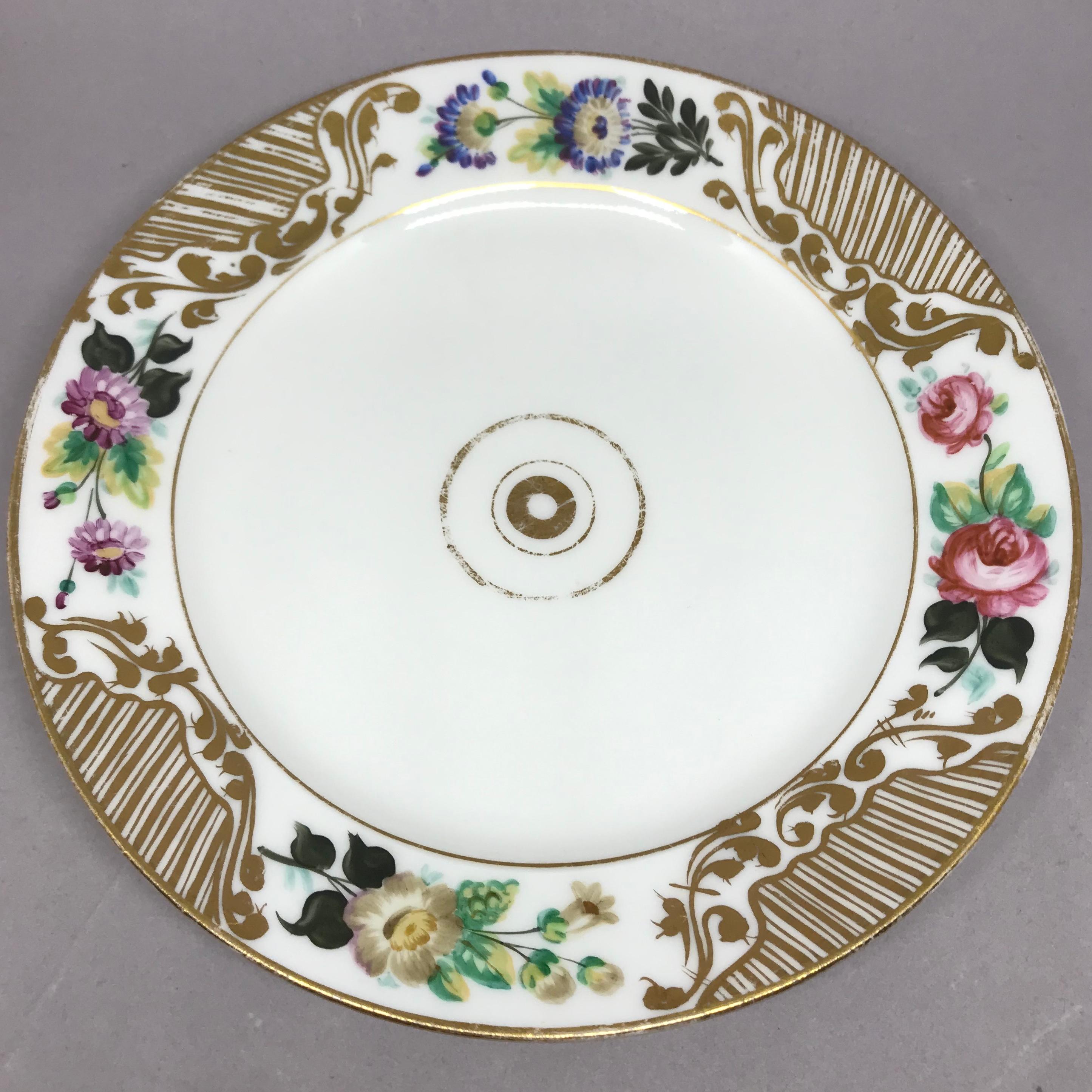 Porcelain Set of Eight Empire Floral and Gilt Decorated Plates For Sale