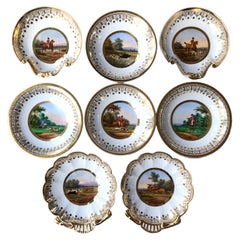 Set of Eight Empire Gilt Porcelain Hunting Plates