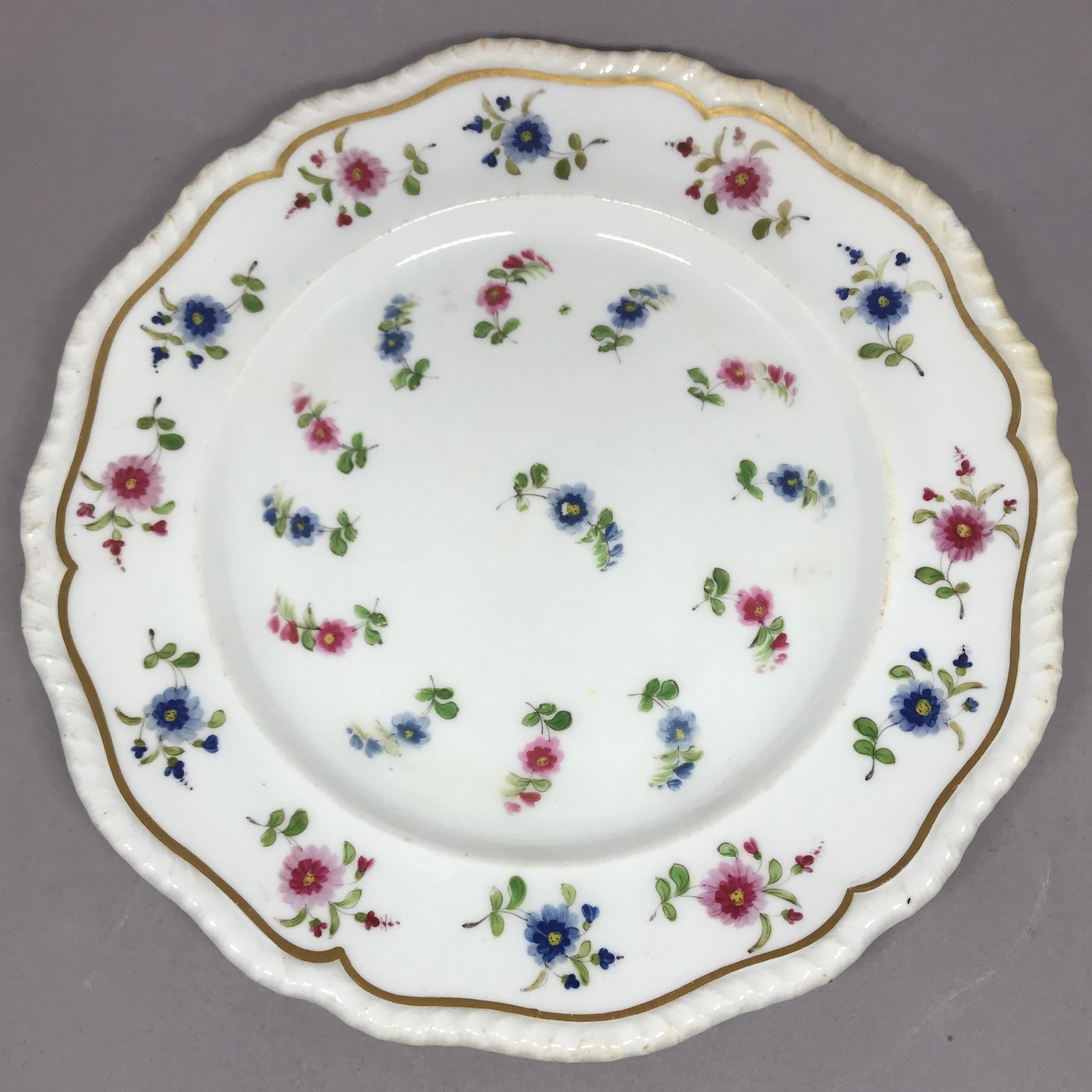 Hand-Painted Set of Eight Blue and Pink Floral Plates For Sale