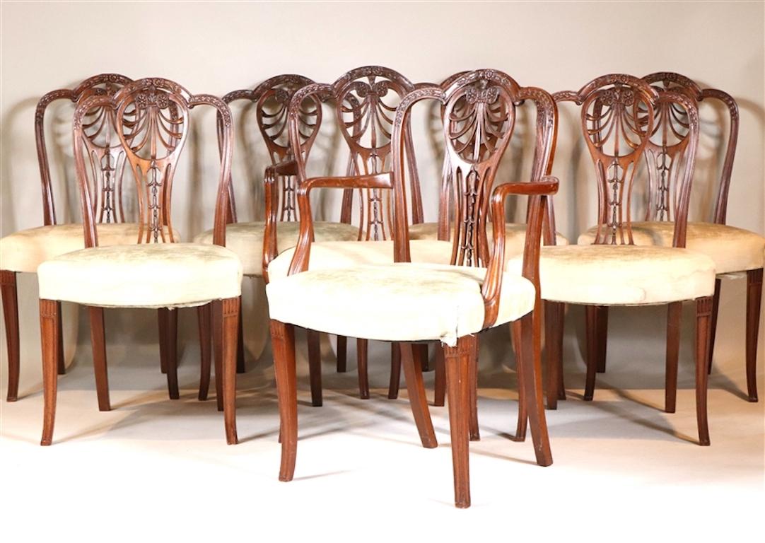 Carved Set of Eight English Mahogany George III Hepplewhite Dining Chairs