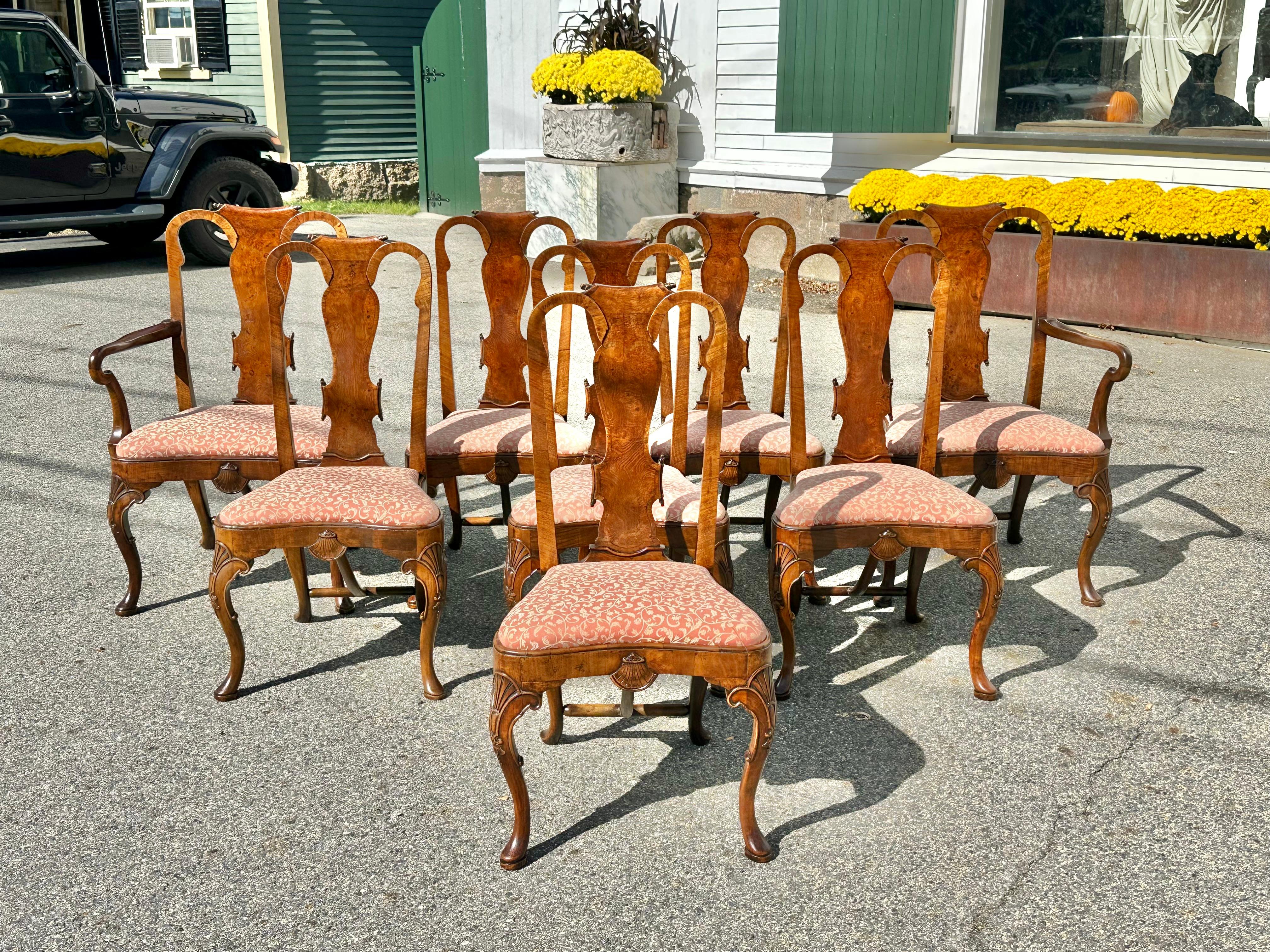 Fine Set of Eight English Walnut and Burl Walnut Queen Anne Dining Chairs.  Beautiful mellow patina.  Well-shaped backs and beautifully carved legs with period detailed stretchers.  Carved shell on knee.  Scrolled top crest. Slip seats.  