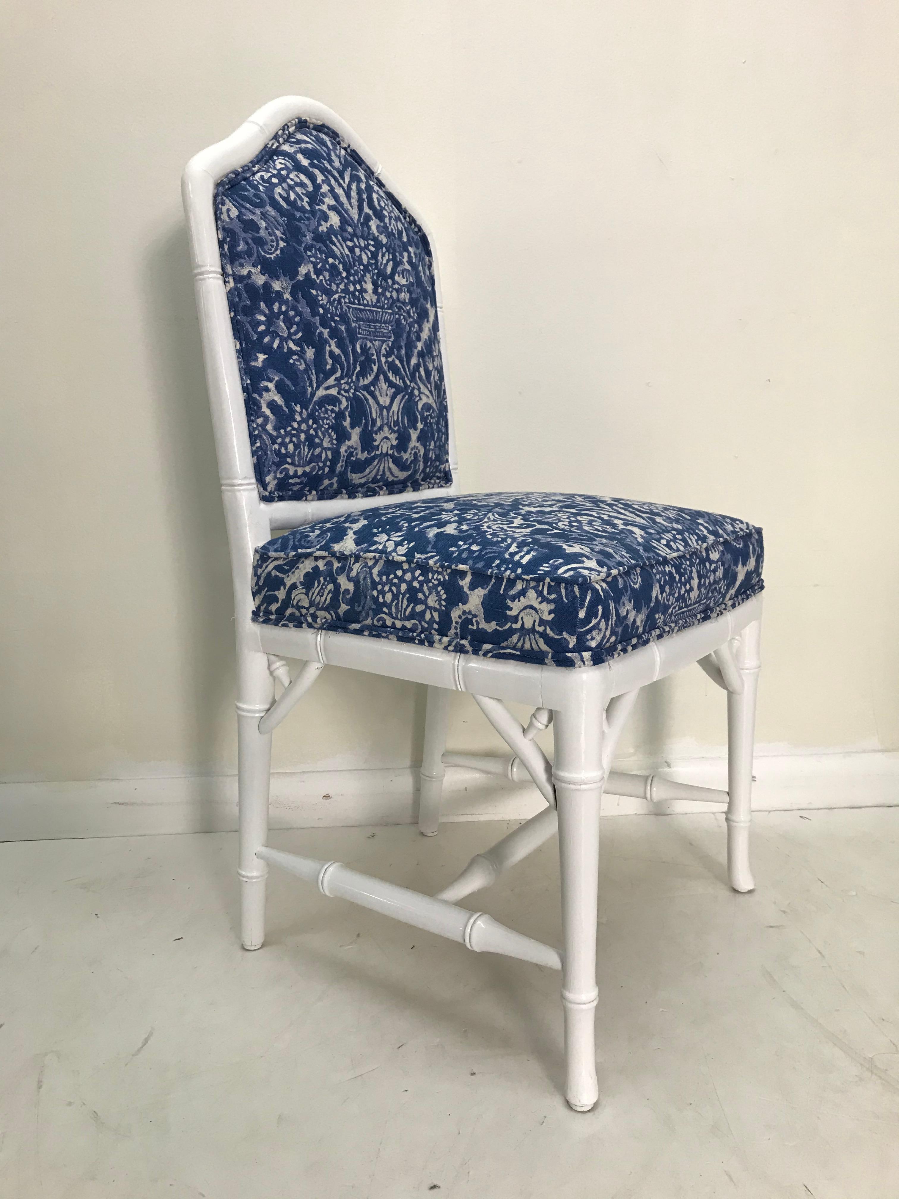 Set of eight faux bamboo vintage white dining chairs with blue vintage Ralph Lauren upholstery.  Seat height 18.5.