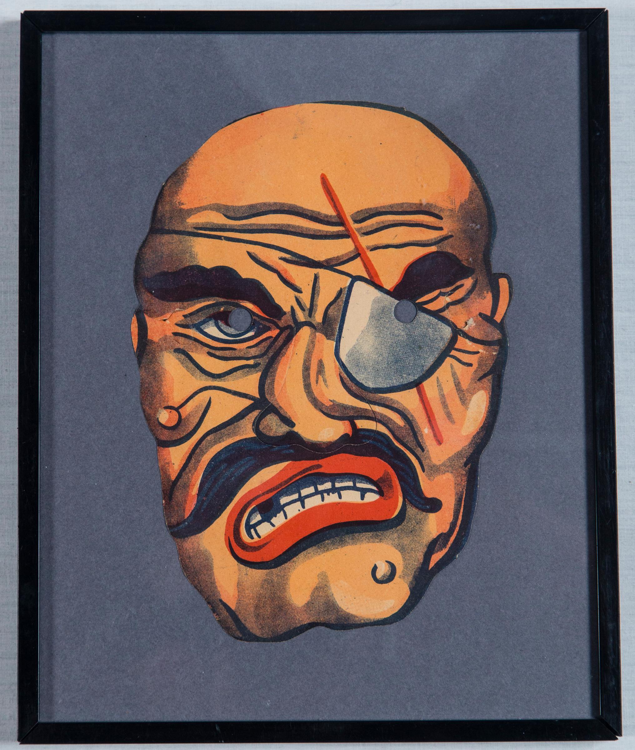 Set von acht gerahmten Masken (Mitte des 20. Jahrhunderts) im Angebot