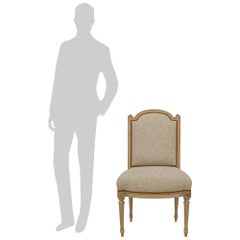 set of eight French 19th century Louis XVI st. patinated Wood dining chairs