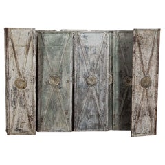Set of Eight French 19th Century Metal and Riveted Doors