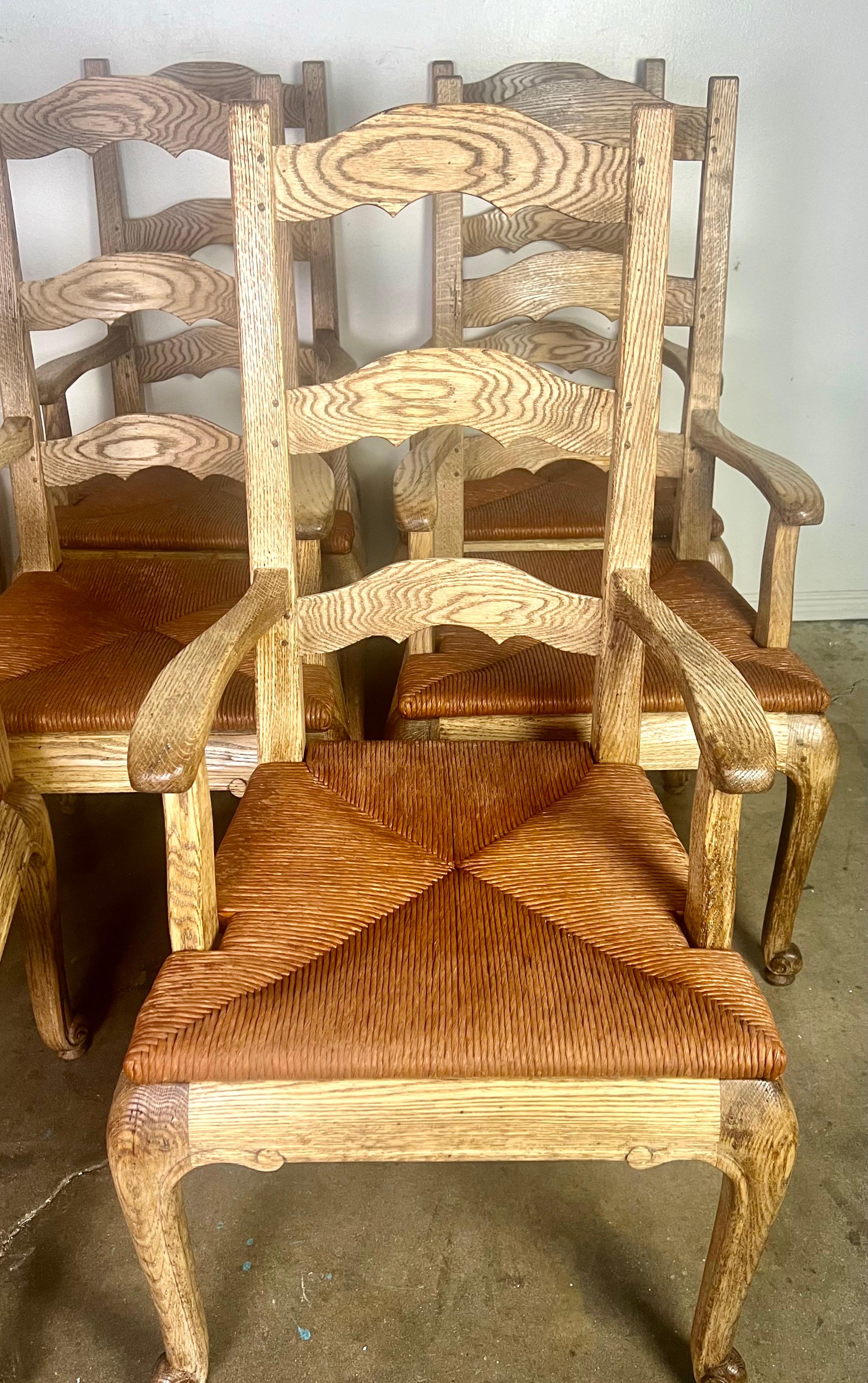 Set of Eight French Country Ladder Back Armchairs w/ Rush Seats  In Distressed Condition For Sale In Los Angeles, CA