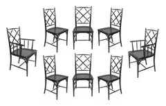 Set of Eight French Hollywood Regency Black Rattan Dining Chairs in Jansen Style