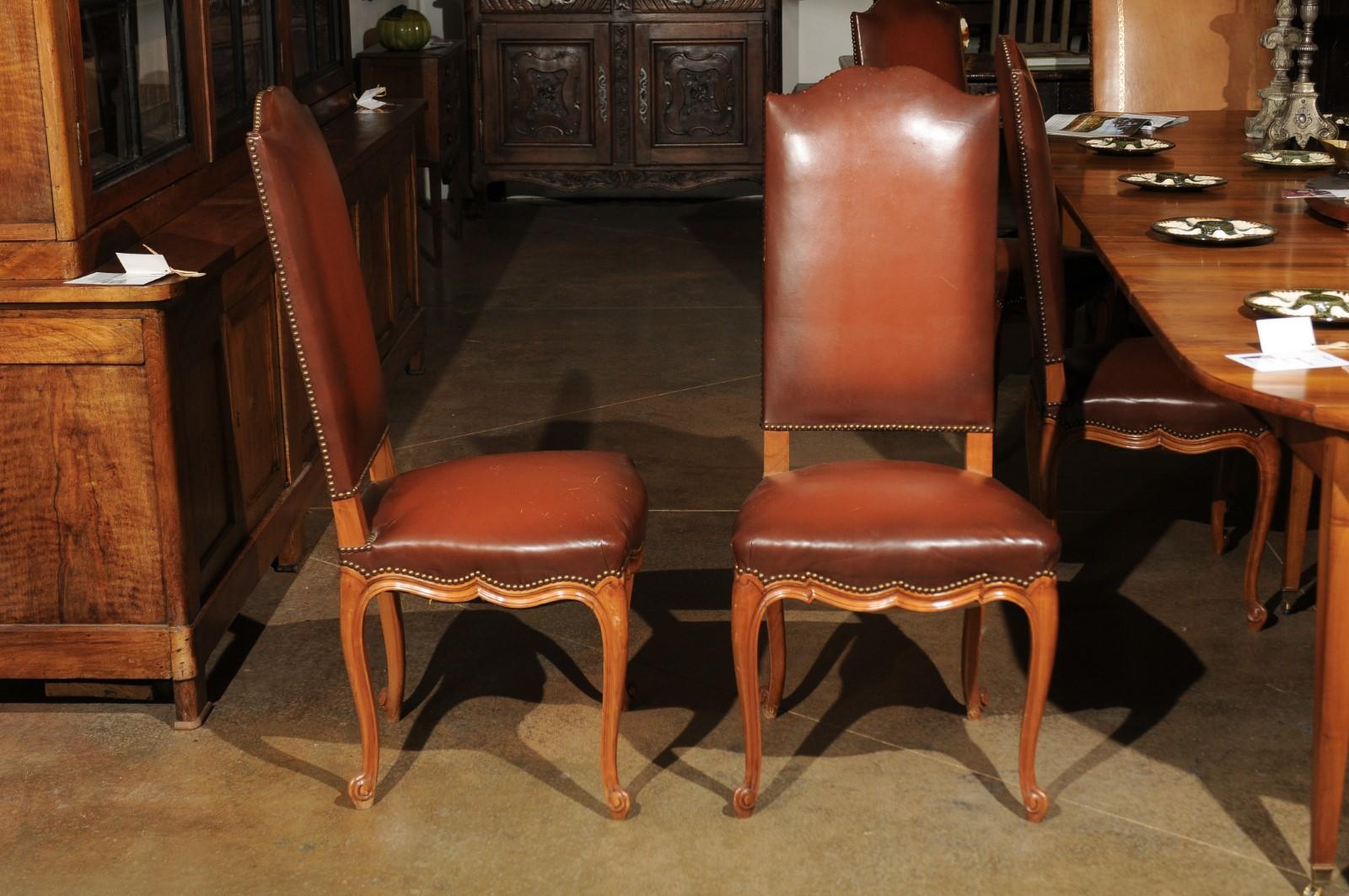Carved Set of Eight French Louis XV Style 19th Century Walnut and Leather Dining Chairs