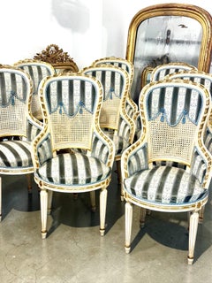 Set of Eight French Louis XVI Style Painted & Gilt Dining Chairs, Caned Backs