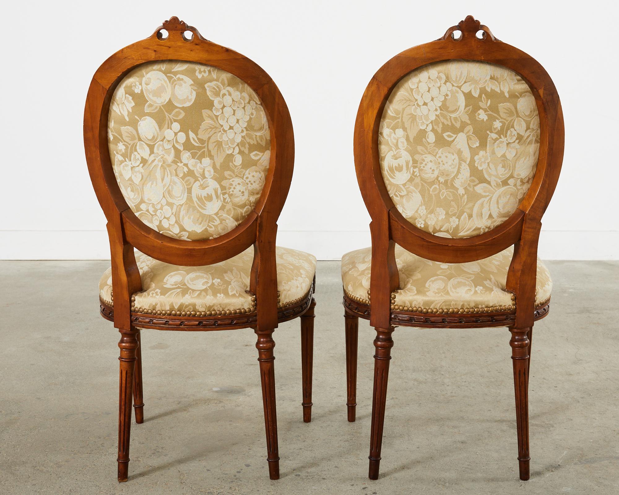 Set of Eight French Louis XVI Style Walnut Dining Chairs 14