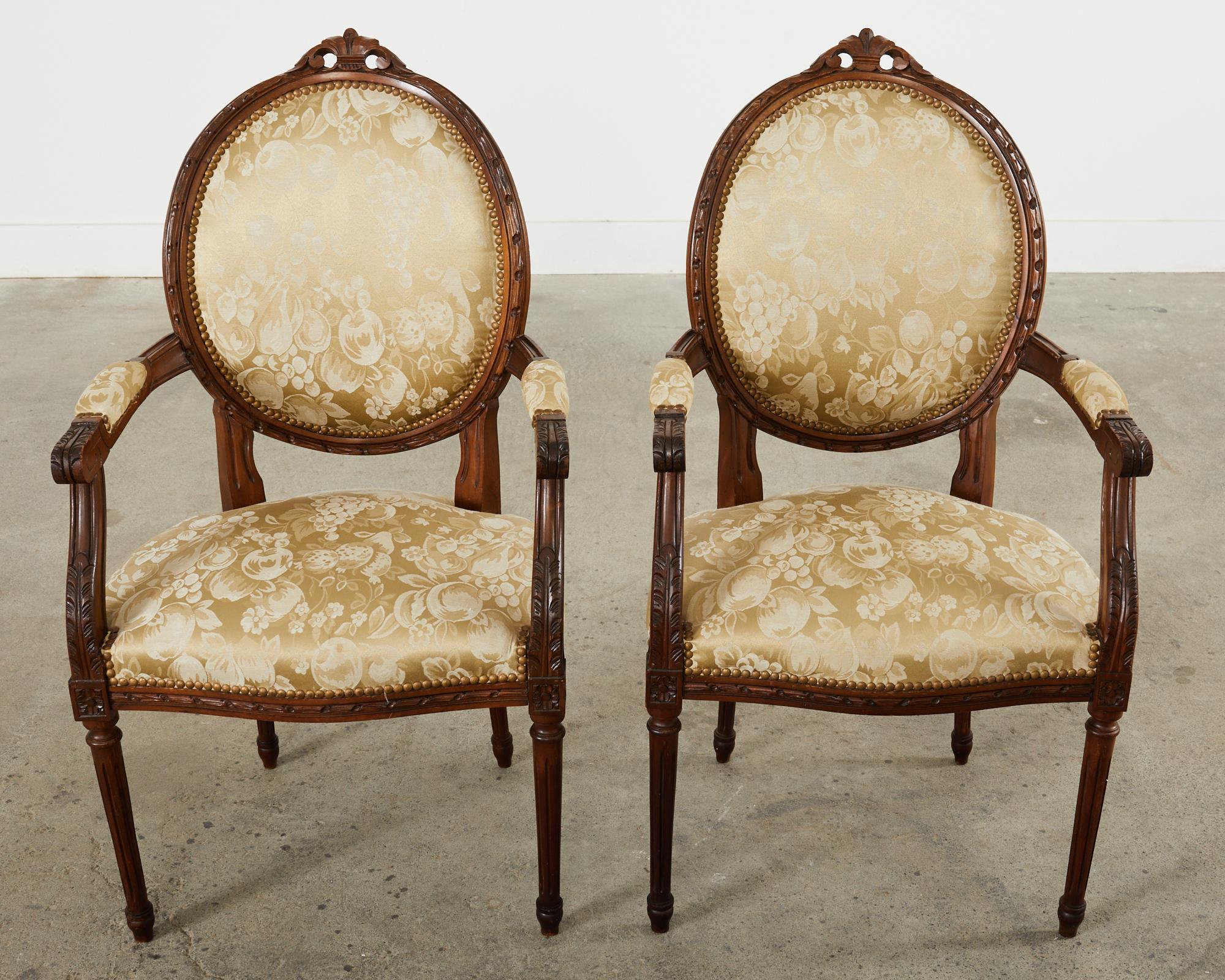 20th Century Set of Eight French Louis XVI Style Walnut Dining Chairs
