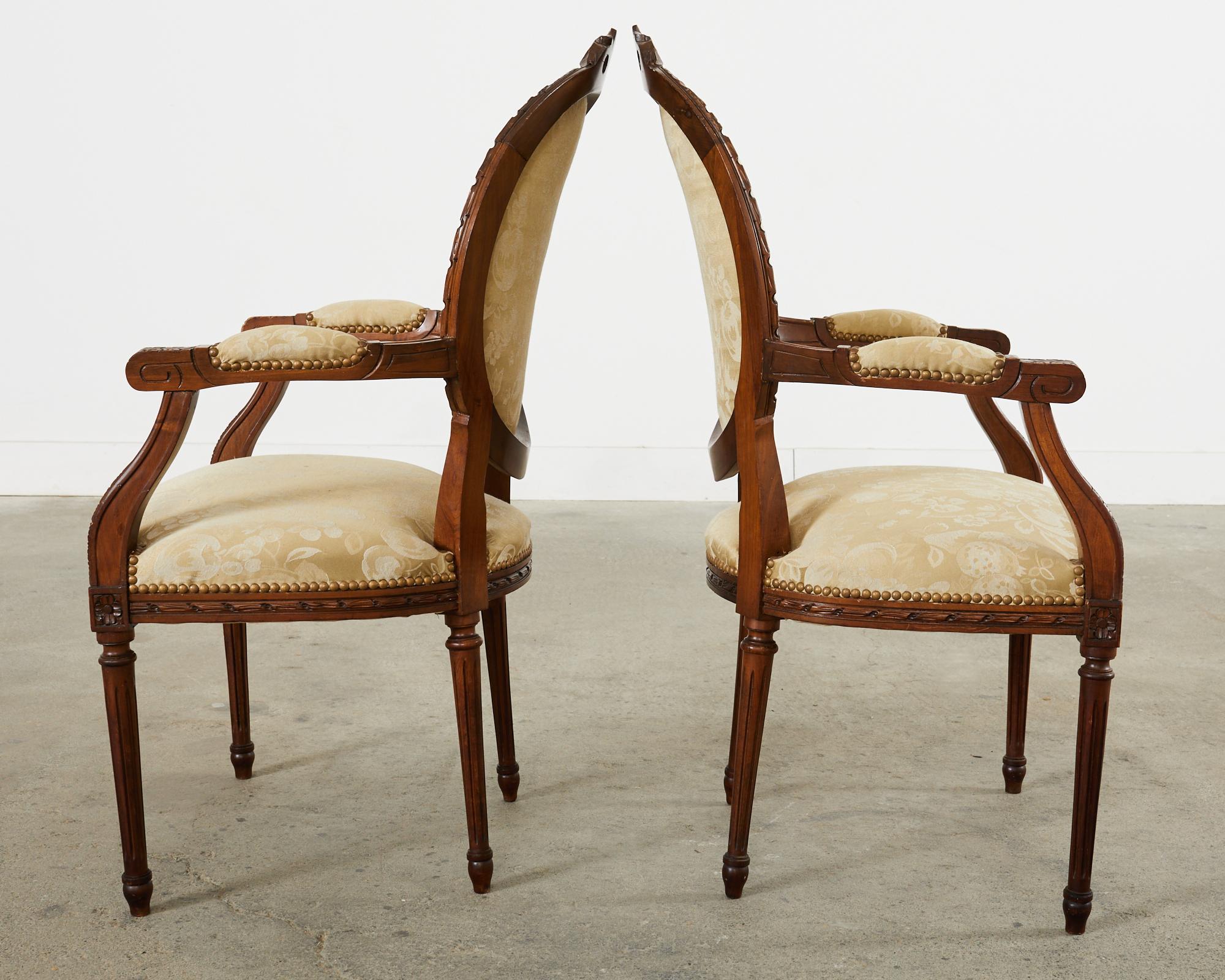 Set of Eight French Louis XVI Style Walnut Dining Chairs 2