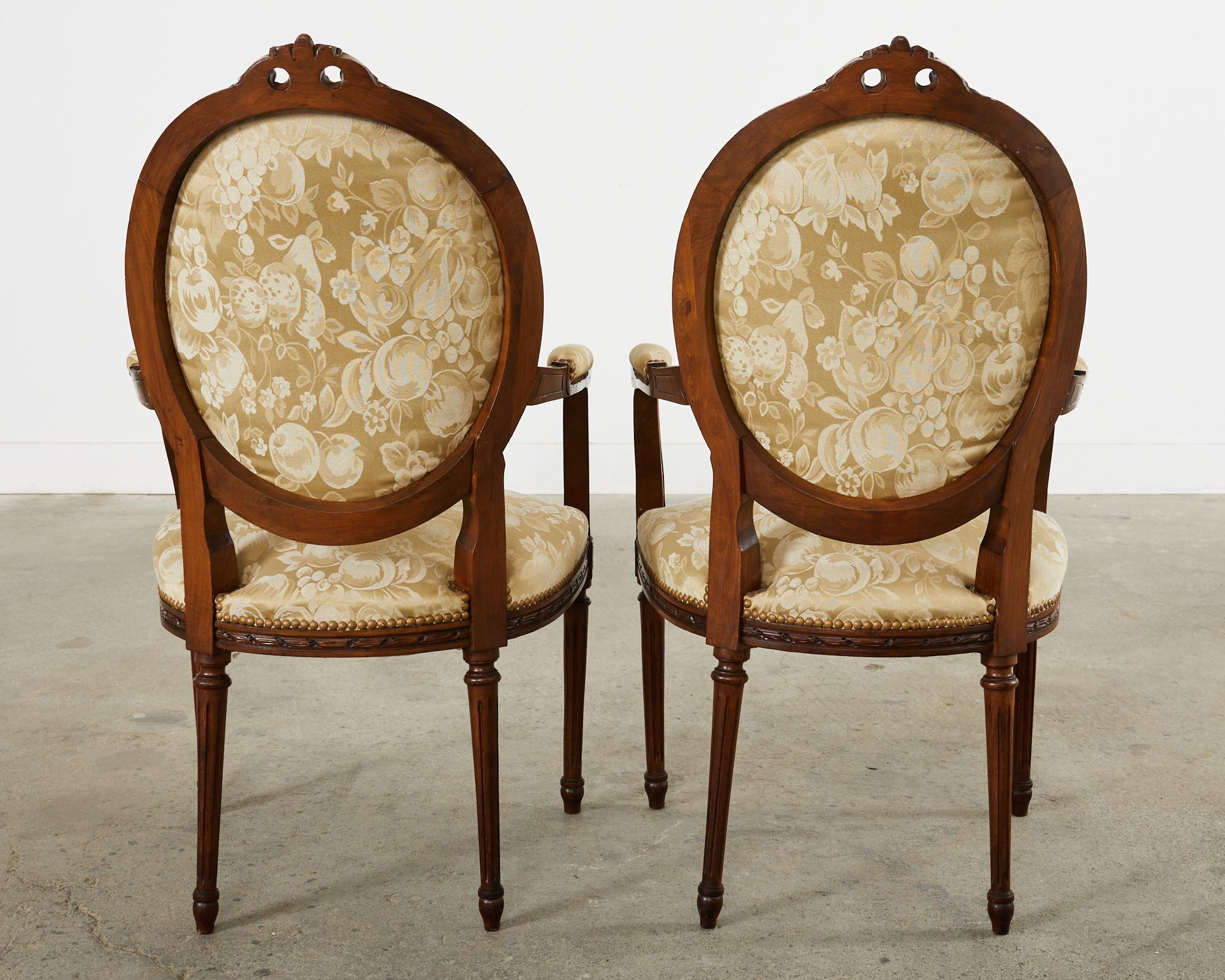 Set of Eight French Louis XVI Style Walnut Dining Chairs 3