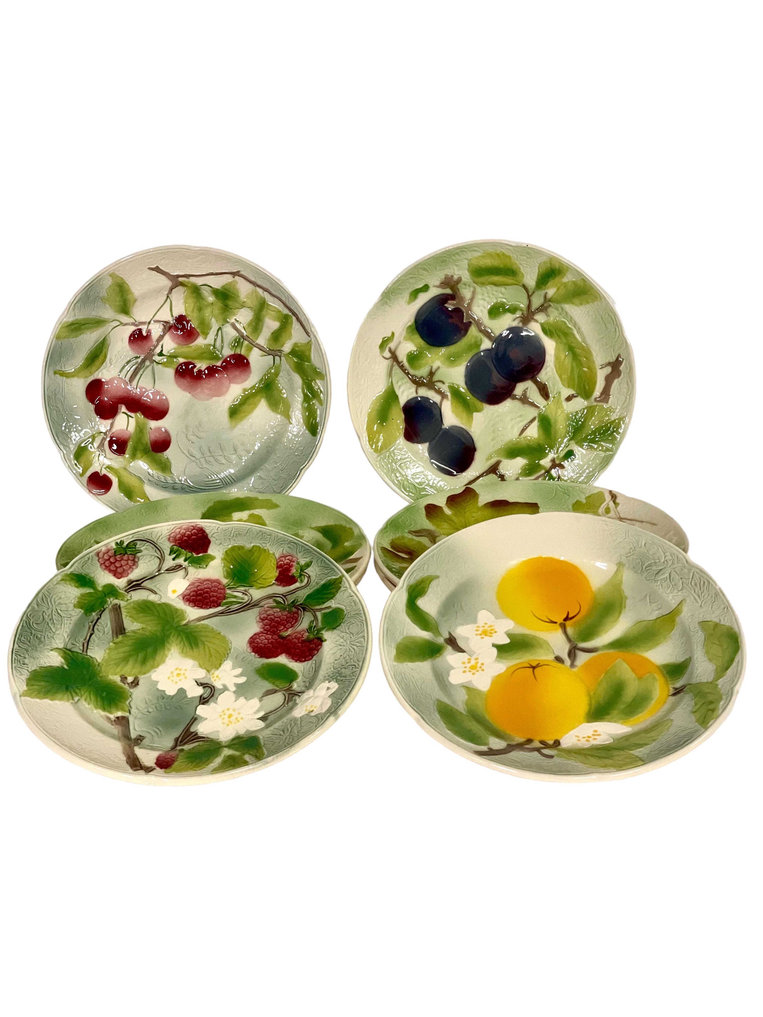 Hand-Painted Set of Eight French Majolica Fruit Plates by Saint-Clément For Sale