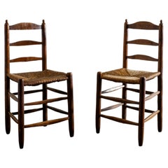Set of Eight French Mid Century Wabi Sabi Dining Chairs in Wood and Rattan 1940s