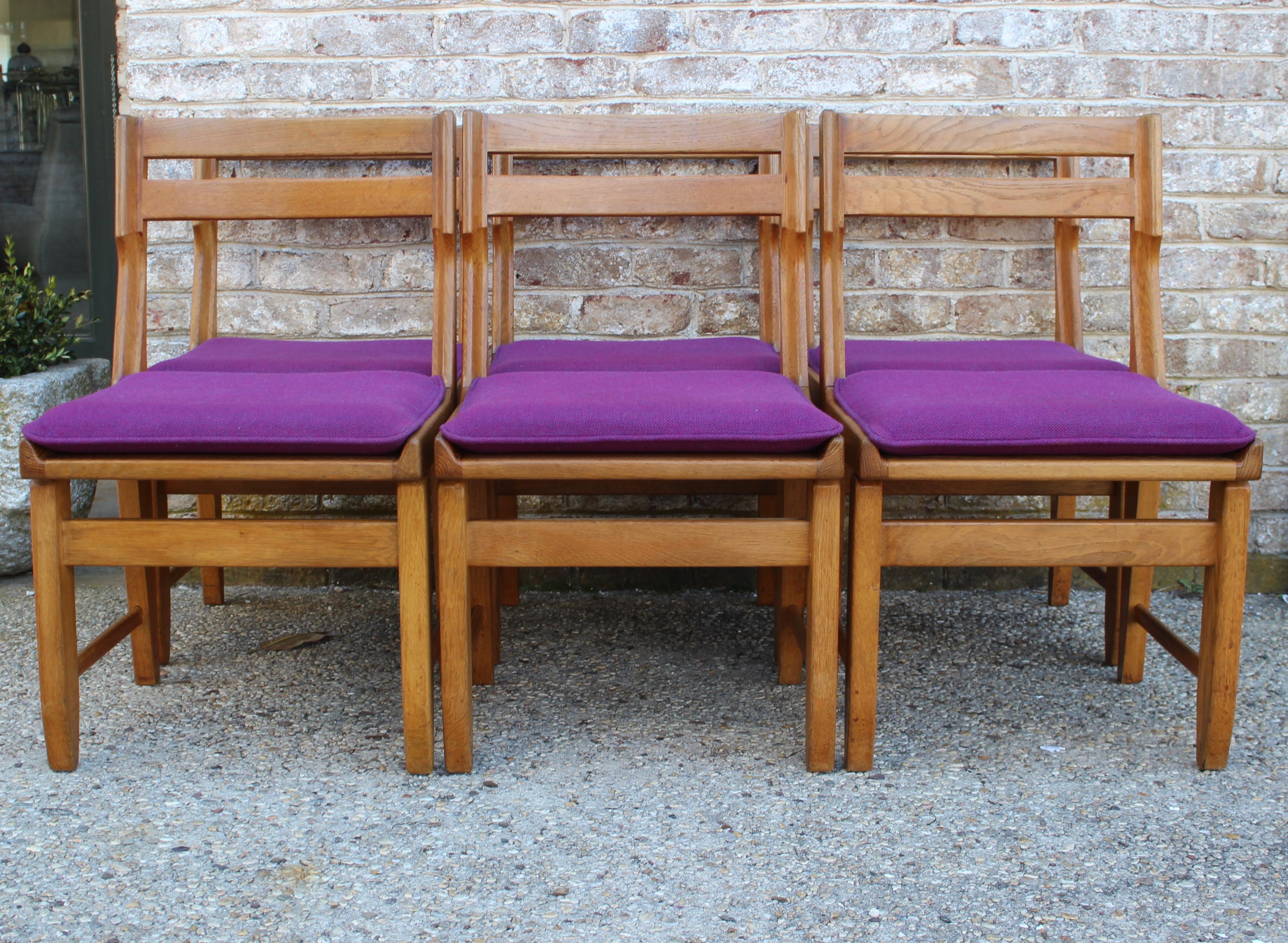 Set of eight oak dining chairs by Guillerme et Chambron... Original upholstery, two of the chairs not pictured.