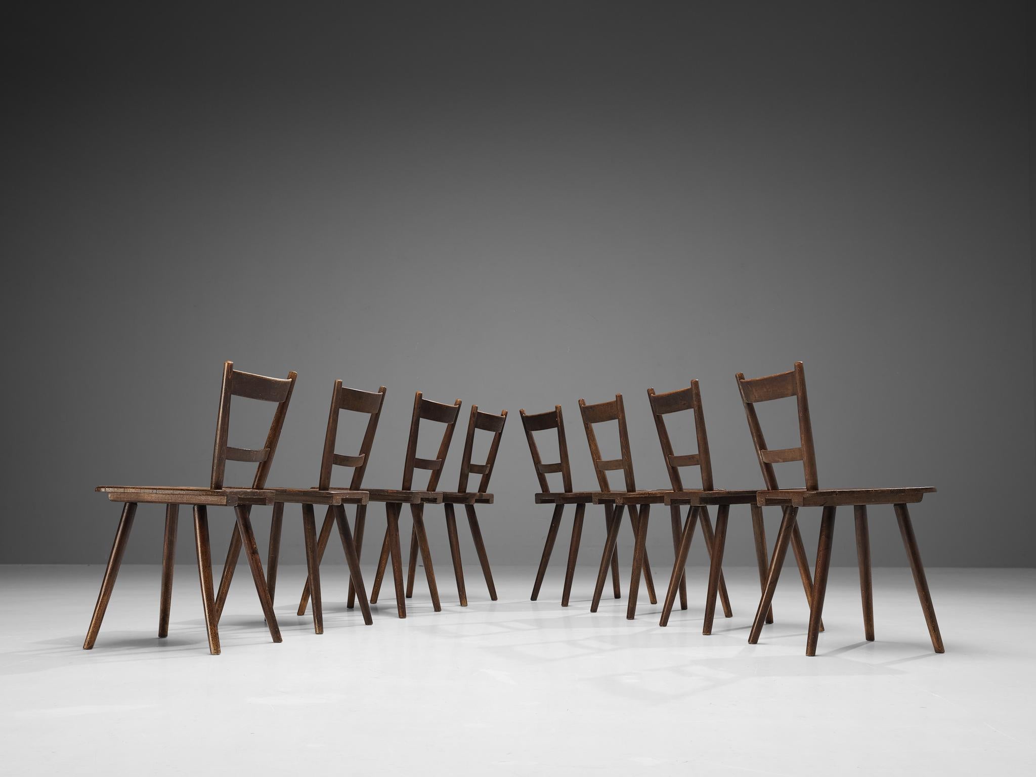 Mid-Century Modern Set of Eight French Pastoral Dining Chairs in Stained Wood For Sale