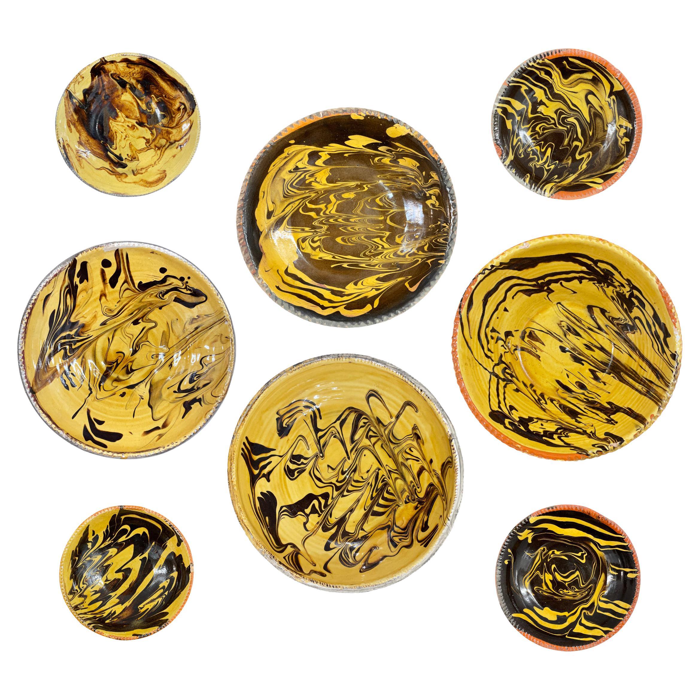 Set of Eight French Swirl Glazed Bowls with Custom Wall Mounts