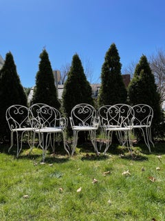 Set of Eight French Wrought Iron Armchairs