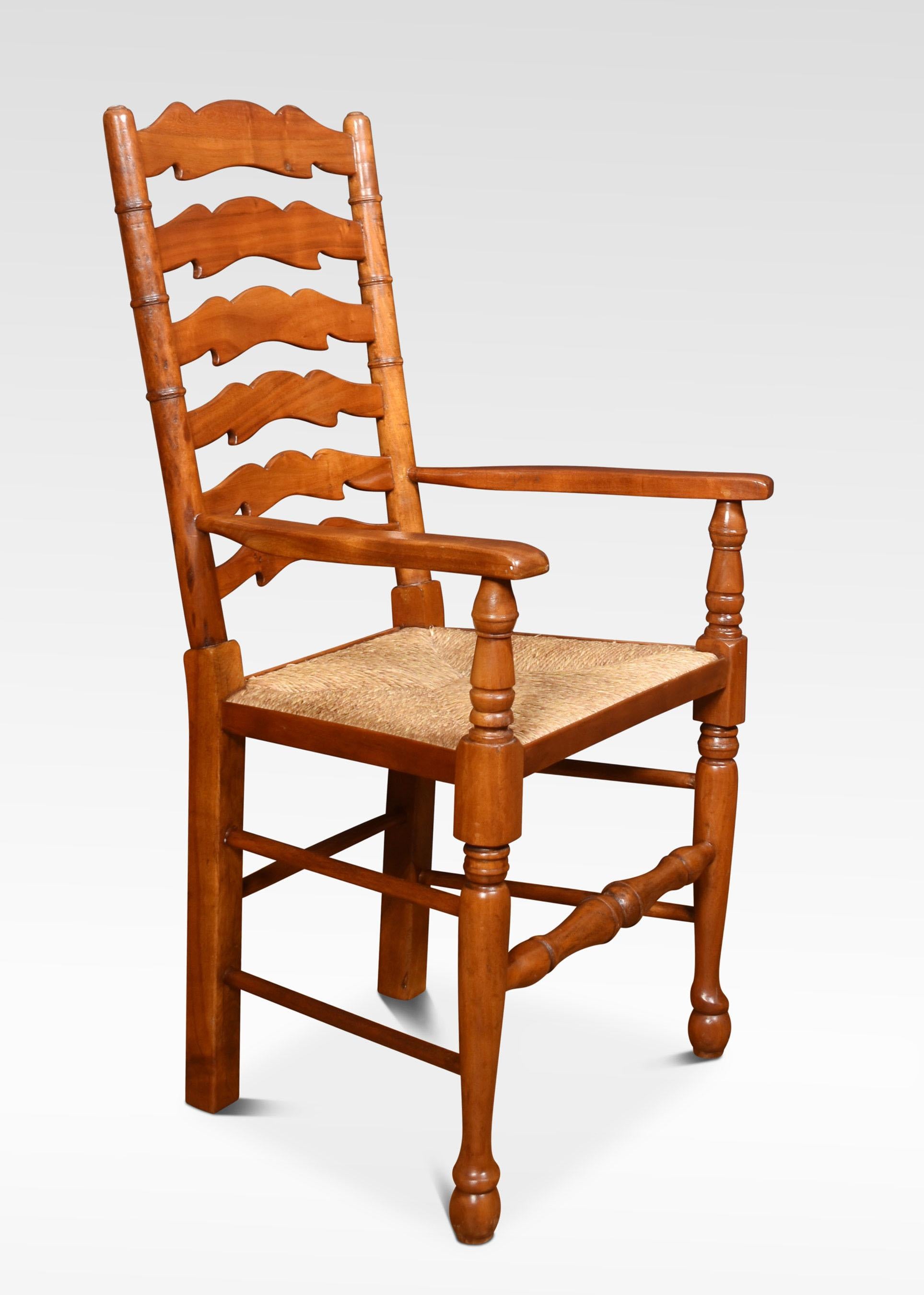 A set of eight ladder back fruitwood dining chairs comprising of two armchairs and six chairs, The ladder backs with rush seats on turned front legs united by stretchers.
Armchairs
Measures: Height 42 inches height to seat 19 inches
Width 22.5