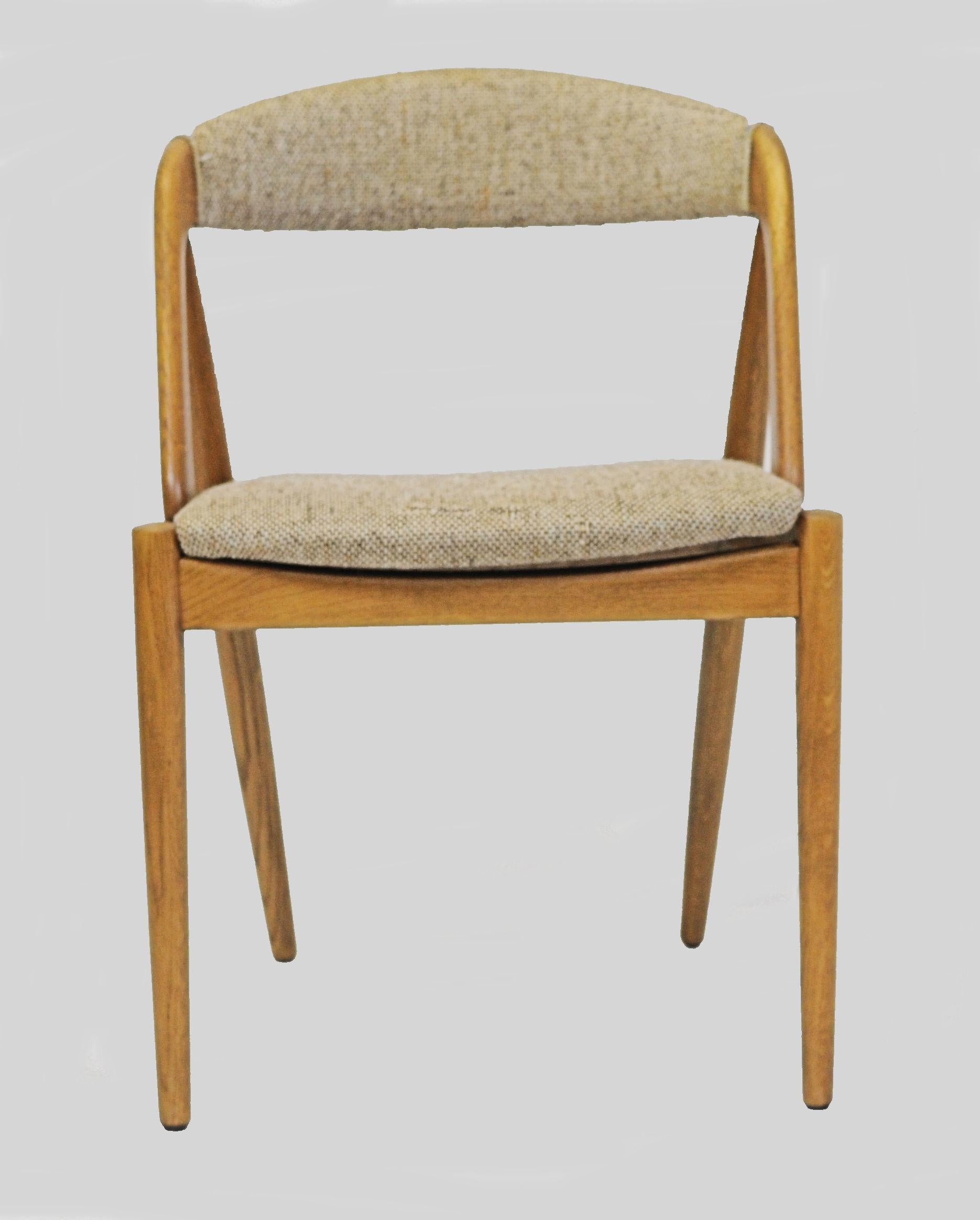 Set of Eight Fully Restored Kai Kristiansen Oak Dining Chairs, Custom UpholsterySet of eight model 31 dining chairs in oak designed by Kai Kristiansen for Schou Andersens Møbelfabrik in 1956.

The model 31 chaie - often called the A frame chair was
