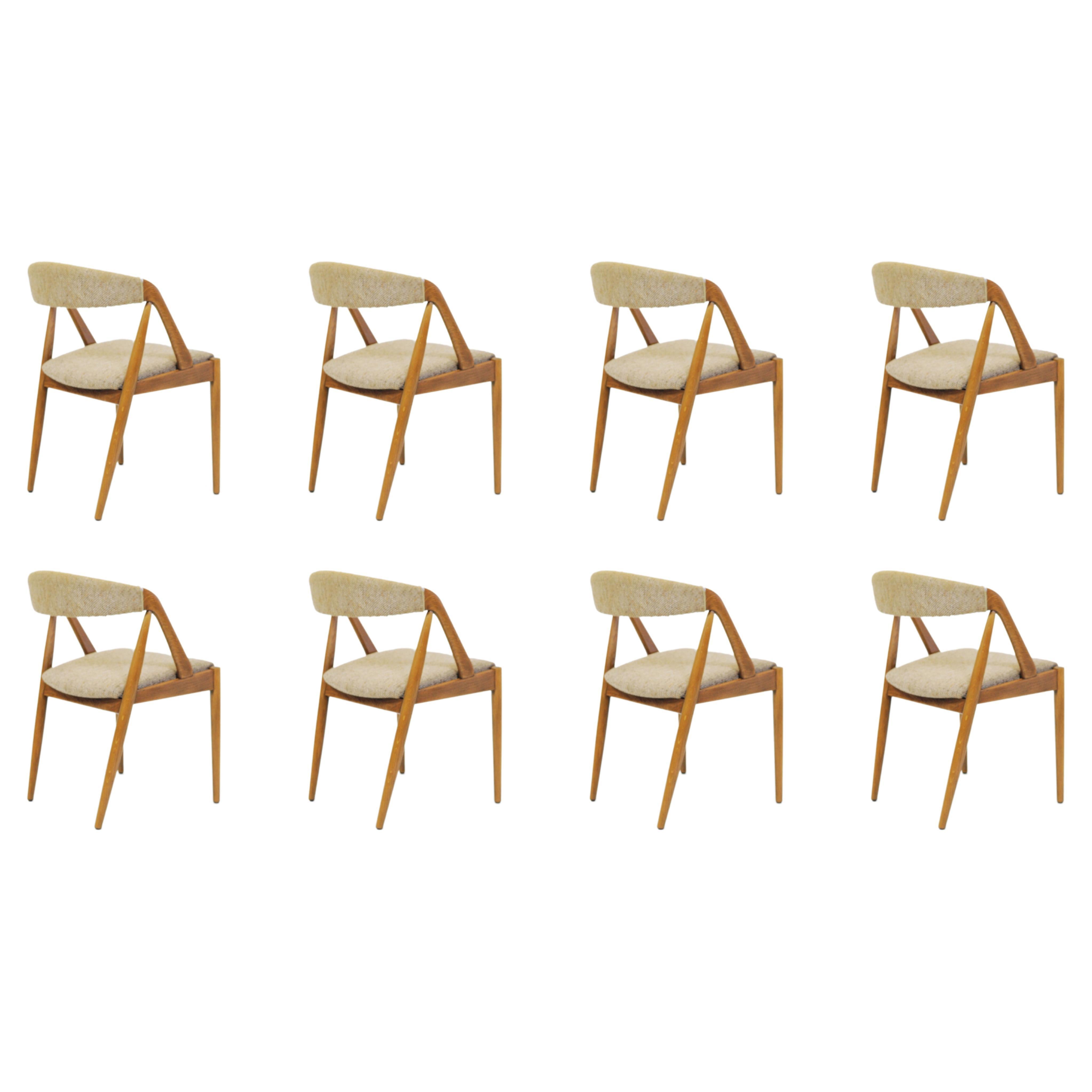 Eight Restored Kai Kristiansen Oak Dining Chairs Custom Reupholstery Included