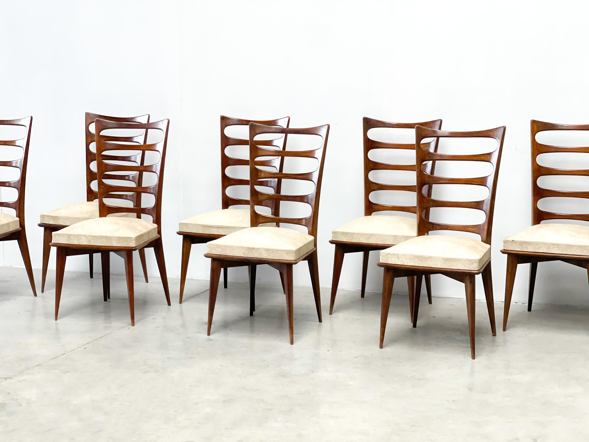 Very nice set of French dining chairs. The chairs are designed by famous French designer Poisson. The chairs were manufactured in the 1970s. They have a very stylish frame where clearly Italian influences can be found.