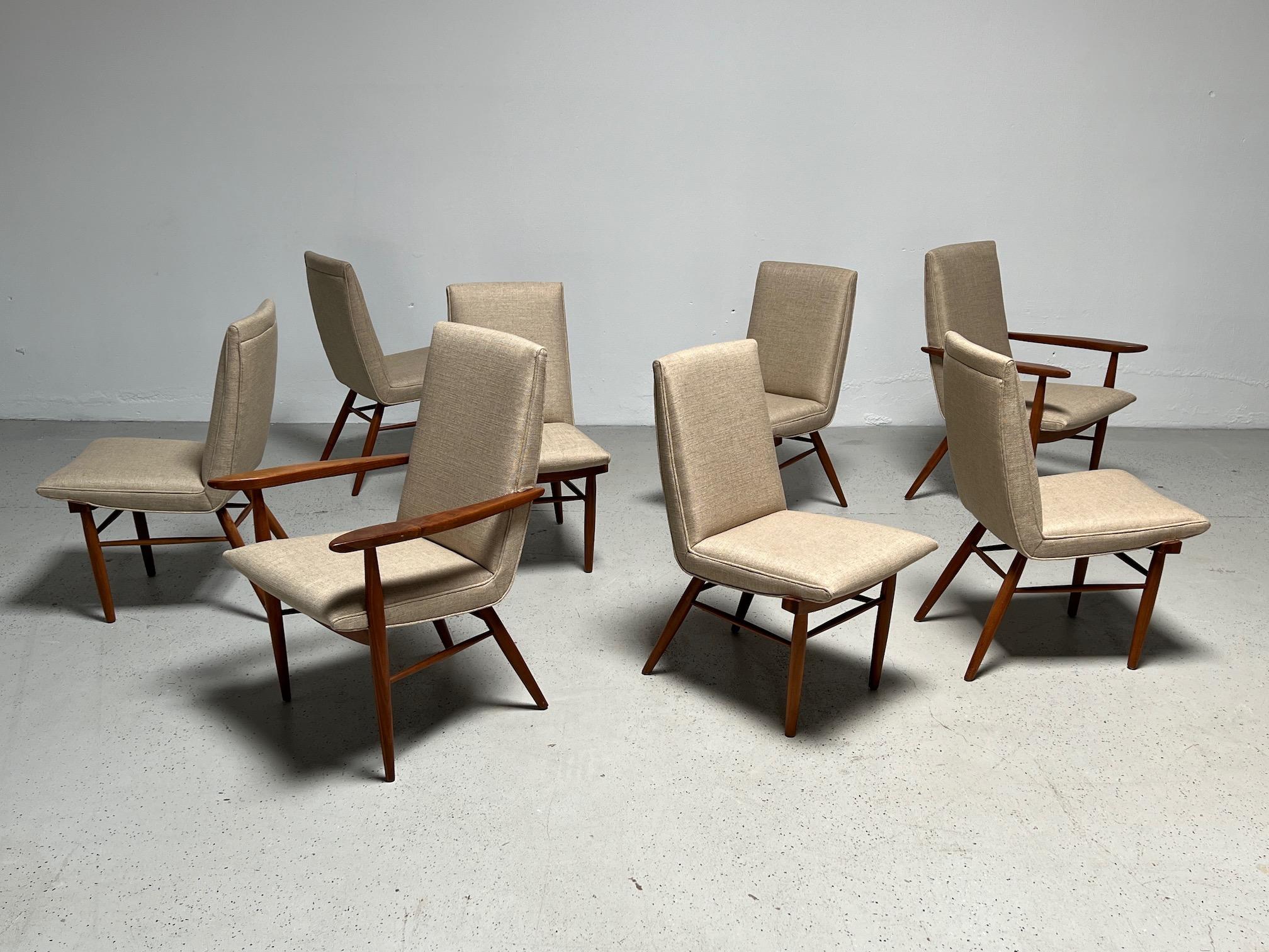 A rare set of eight model 206 dining chairs in walnut designed by George Nakashima for Widdicomb.
