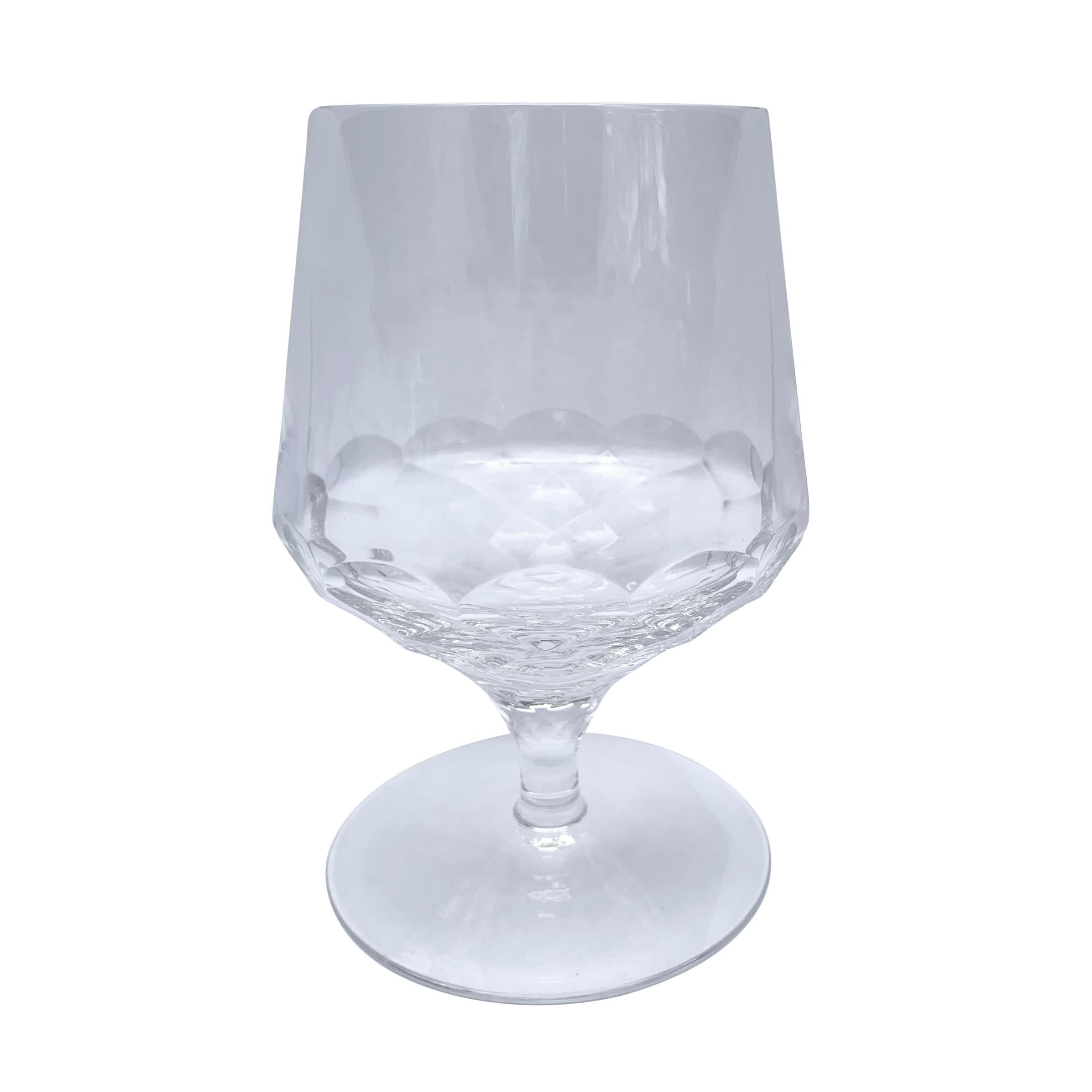 A beautiful set of eight weighty hand blown facet-cut crystal glasses inspired by 18th century Georgian patterns of similar style. Great for mixed cocktails, brandy, or whatever poison you prefer.