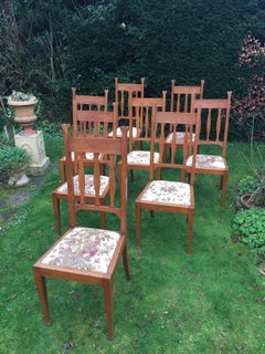 Set of Eight Golden Oak Arts & Crafts Dining Chairs Retaining the Original Label