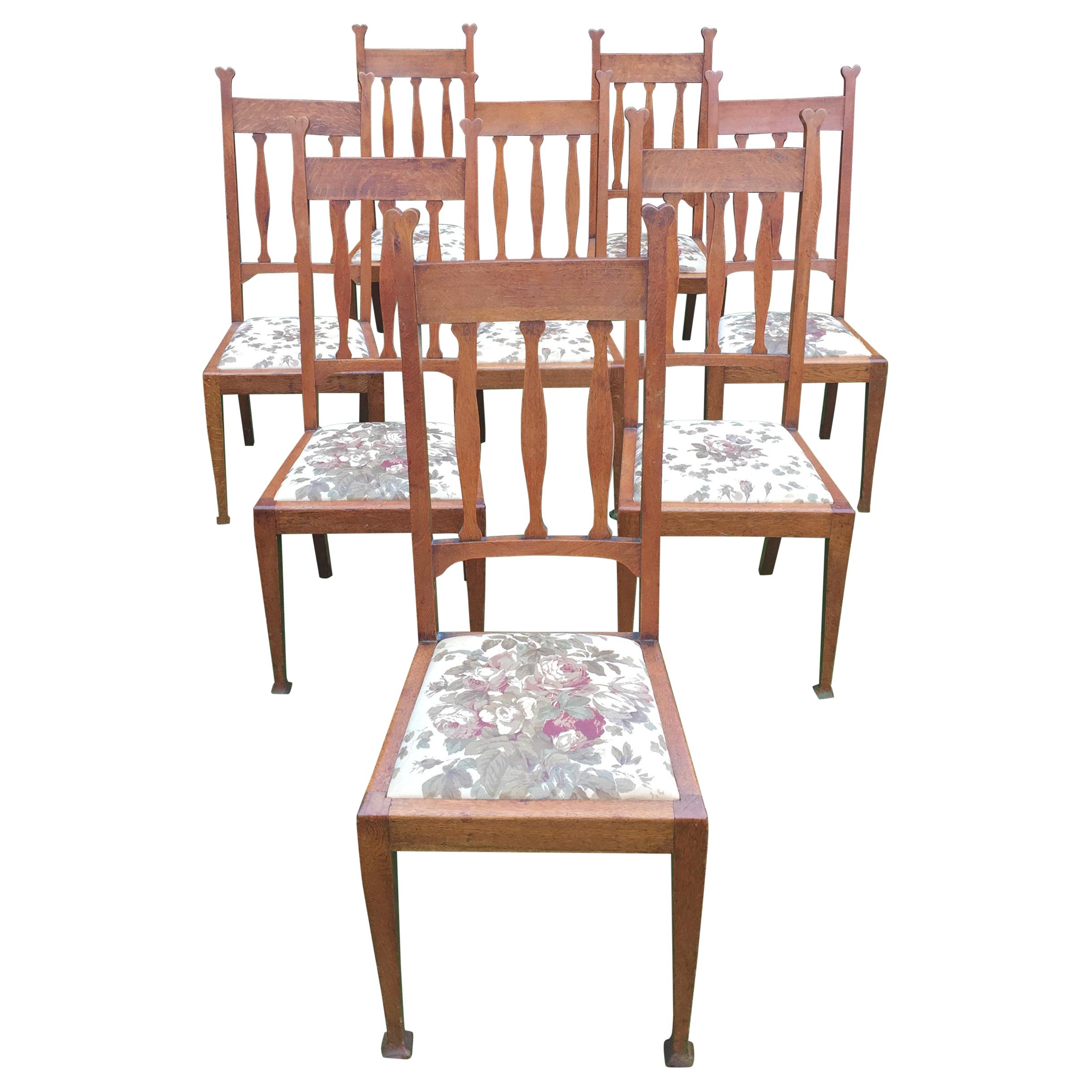 Set of Eight Golden Oak Arts & Crafts Dining Chairs Retaining the Original Label