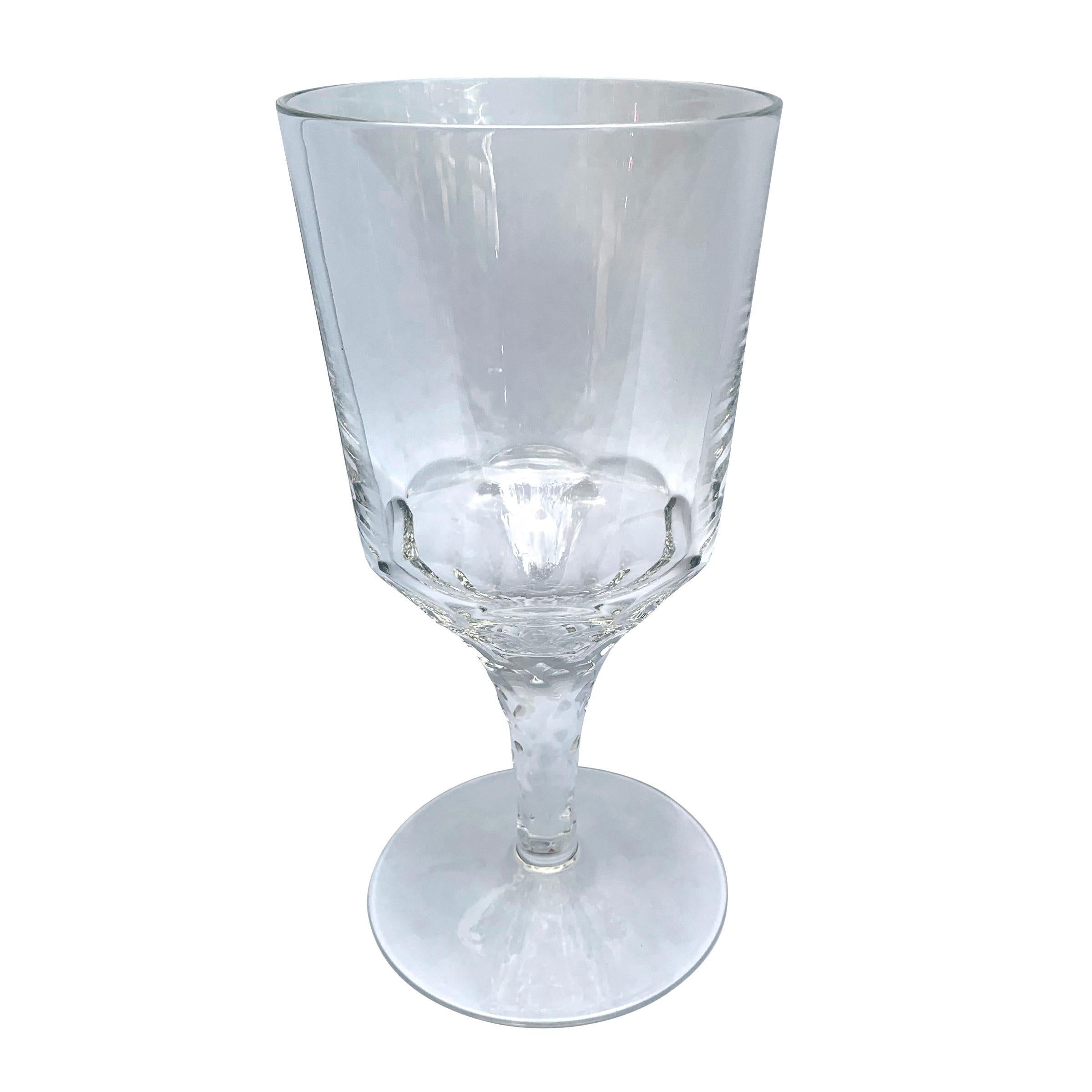 A fantastic set of eight heavy hand-blown crystal wine glasses, inspired by 18th century Georgian wine goblets, each with a facet-cut stem.