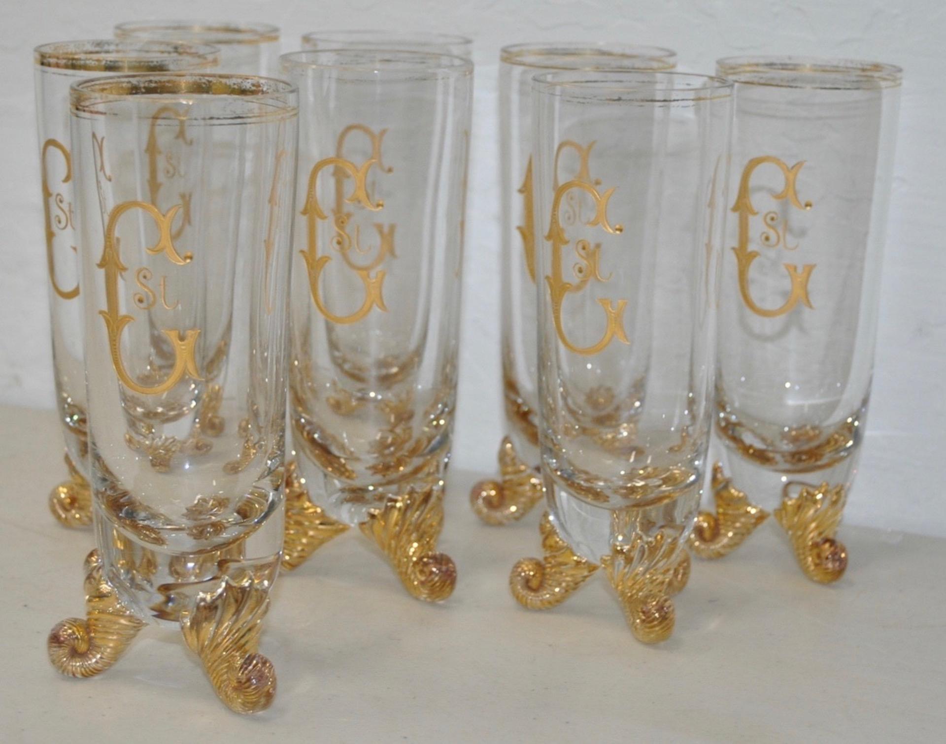 Set of eight hand blown and gilded venetian glasses

Fantastic set of hand painted bar glasses.

Each glass measures 2.5