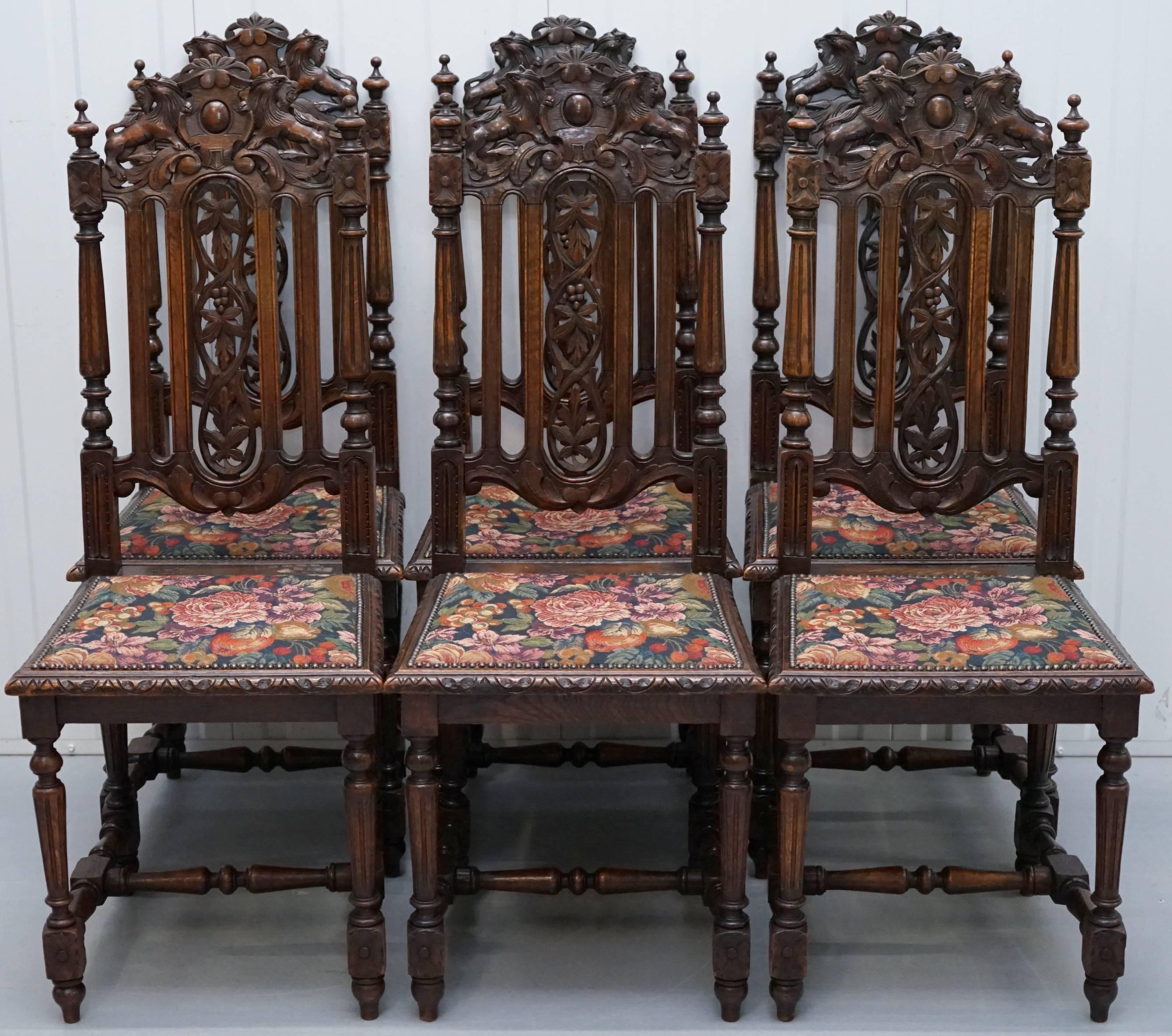 We are delighted to offer for sale this stunning set of eight early Victorian hand-carved oak dining chairs made in the Jacobean manor

A set of eight early Victorian dark oak high back dining chairs of Carolean design, including two armchairs,