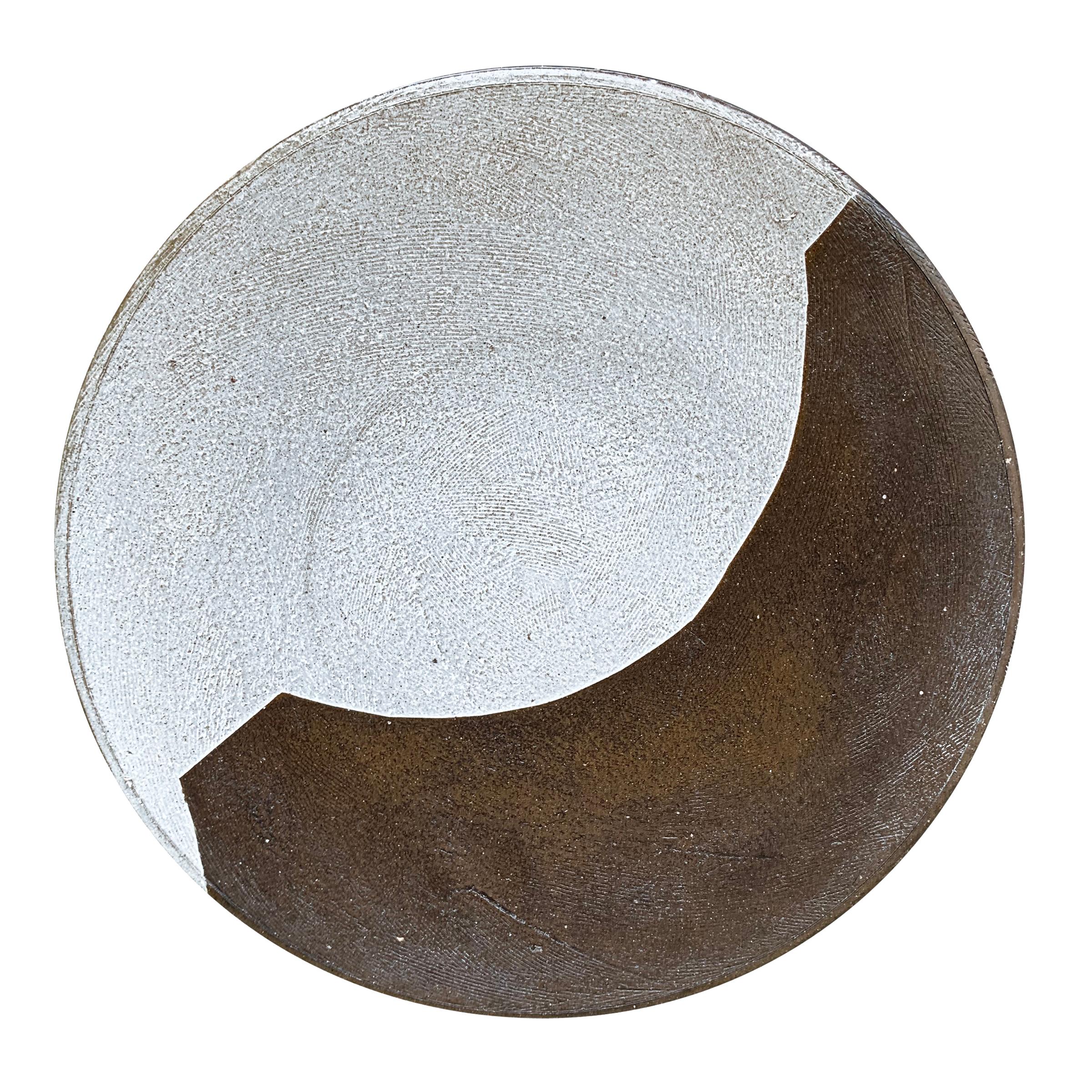 A fantastic set of eight hand-thrown dark brown stoneware dinner plates each with a unique bold white slip-glaze motif, and etched with a tool to add texture and a subtle sophisticated design.