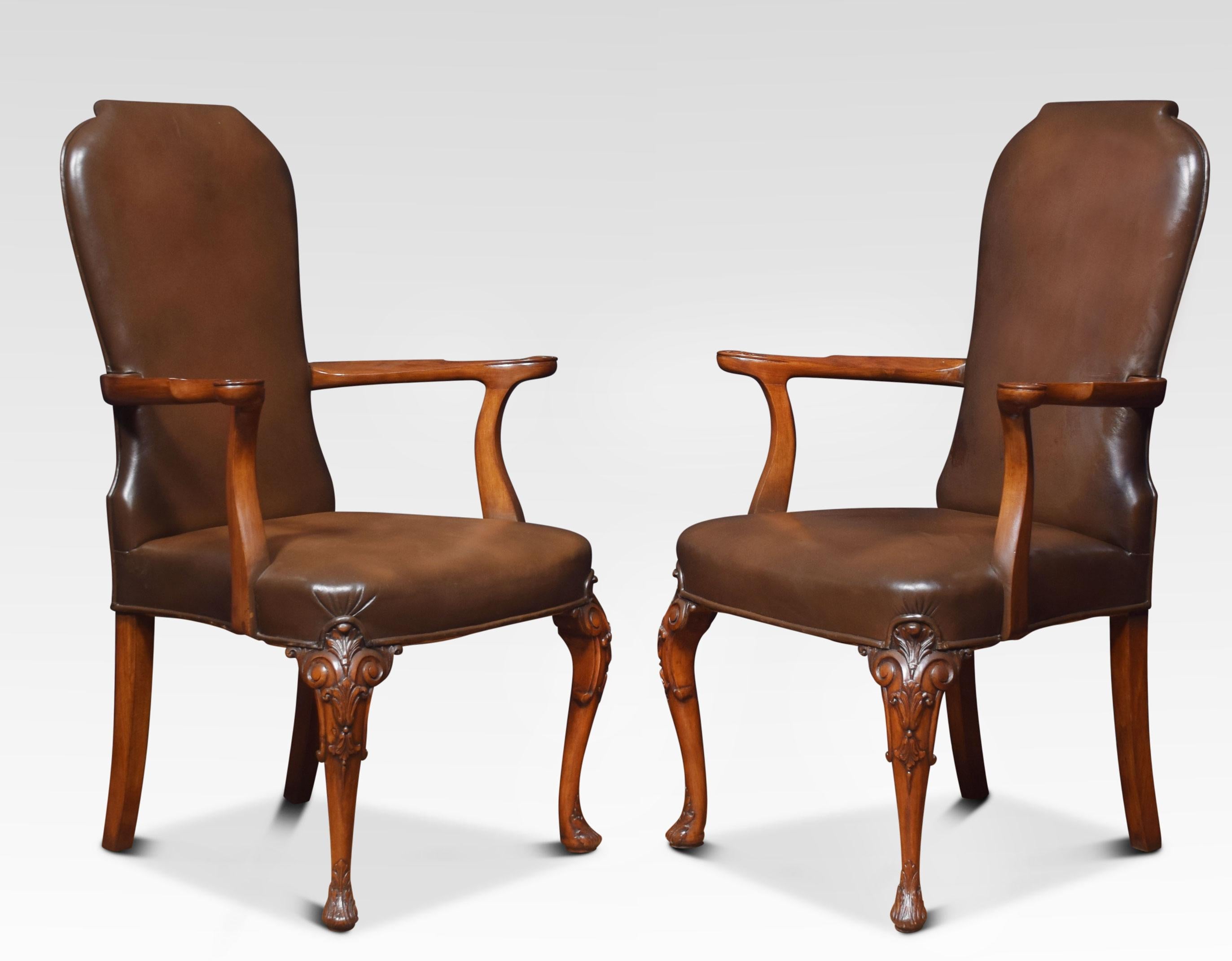Set of eight walnut high back dining chairs. Comprising of two armchairs and six side chairs, having shaped brown leatherbacks and seat. Raised up on cabriole front supports terminating in scrolled feet.
Dimensions
Armchairs
Height 42 inches