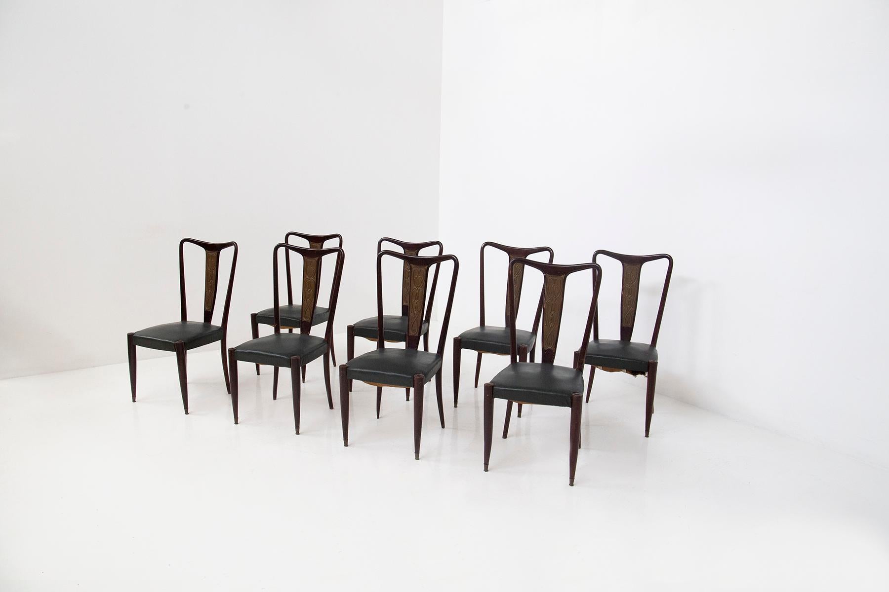 Step back in time to the enchanting 1950s, where craftsmanship and design merged into a symphony of elegance. Behold this exceptional set of eight Italian chairs, a testament to the era's unparalleled artistry and attention to detail.

Each chair is