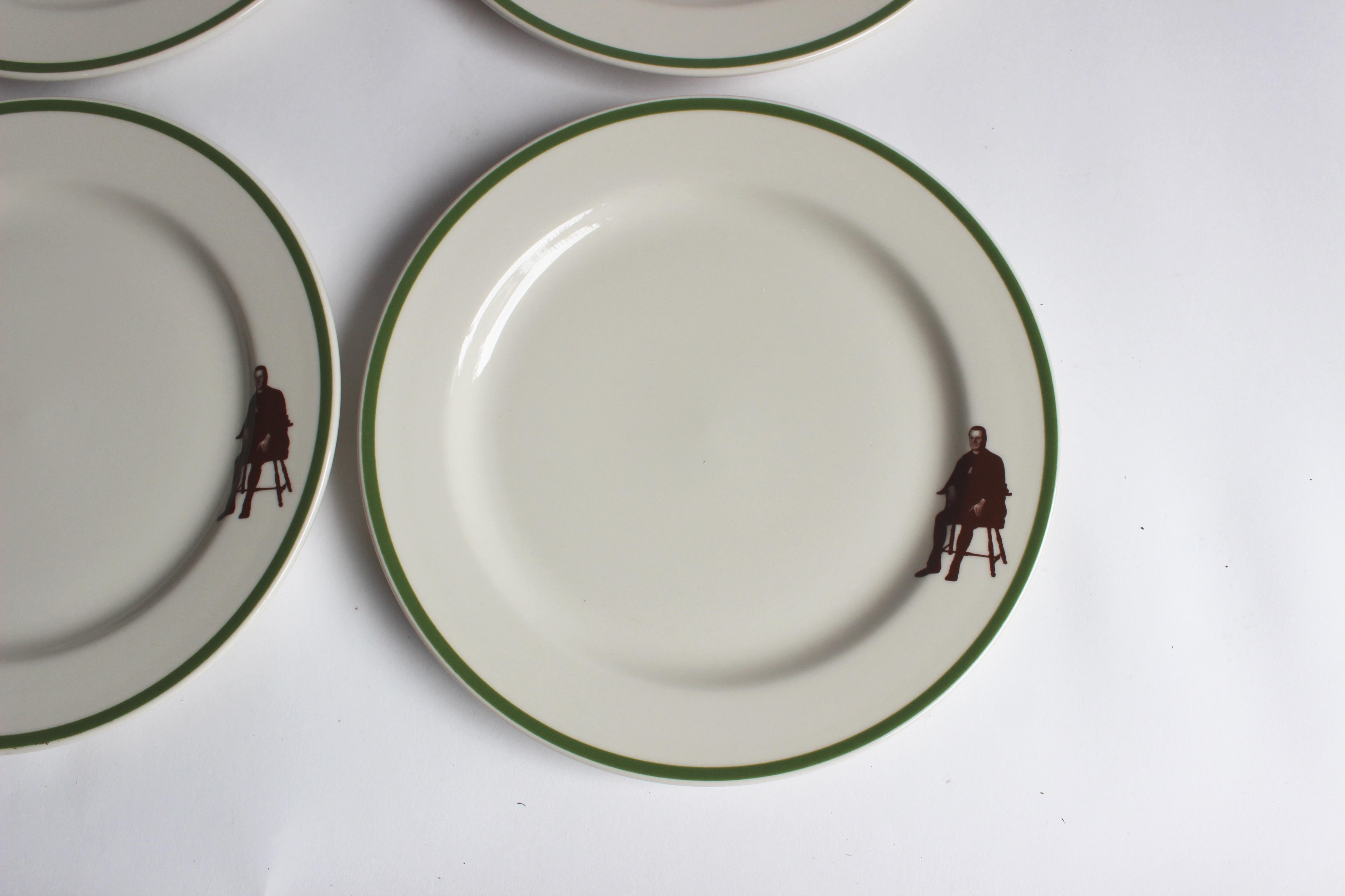 Set of eight large dinner plates by Homer Laughlin.