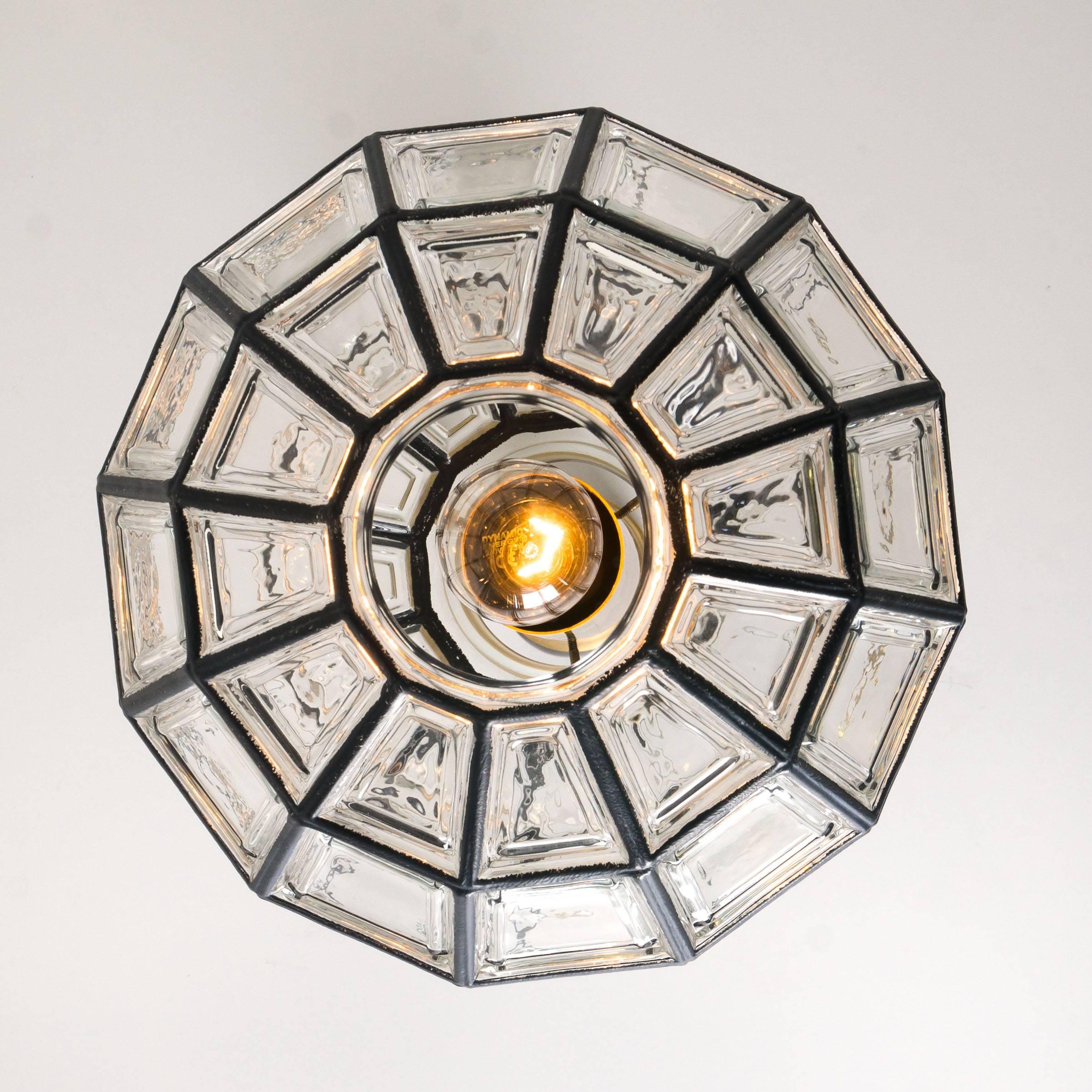 German Set of Eight Iron and Clear Glass Light Fixtures by Limburg, circa 1965 For Sale