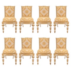 Ensemble de huit chaises de salle à manger italiennes en bois doré de style néoclassique du 19ème siècle